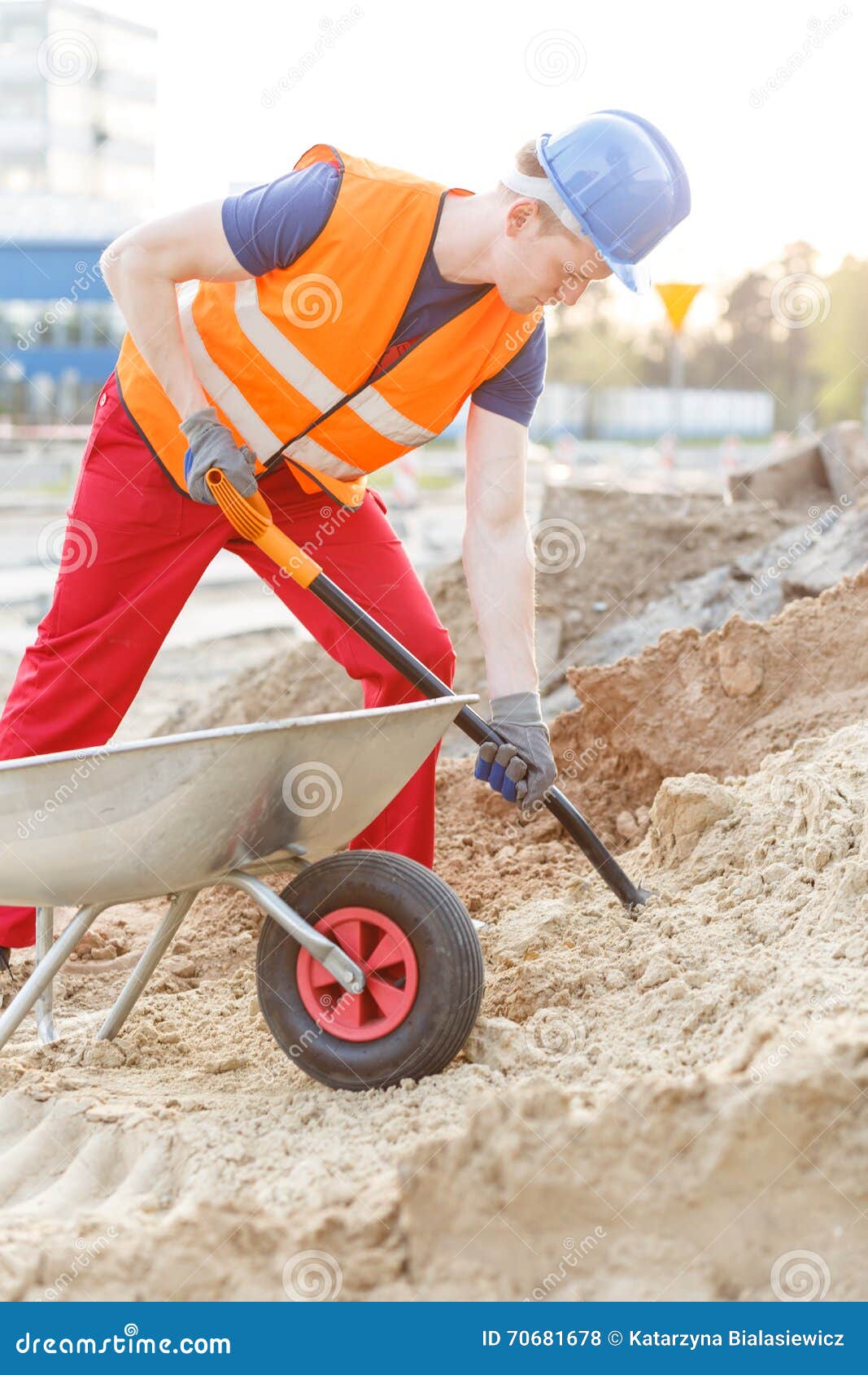 Builder with Shovel and Barrow Stock Photo Image of outside, site