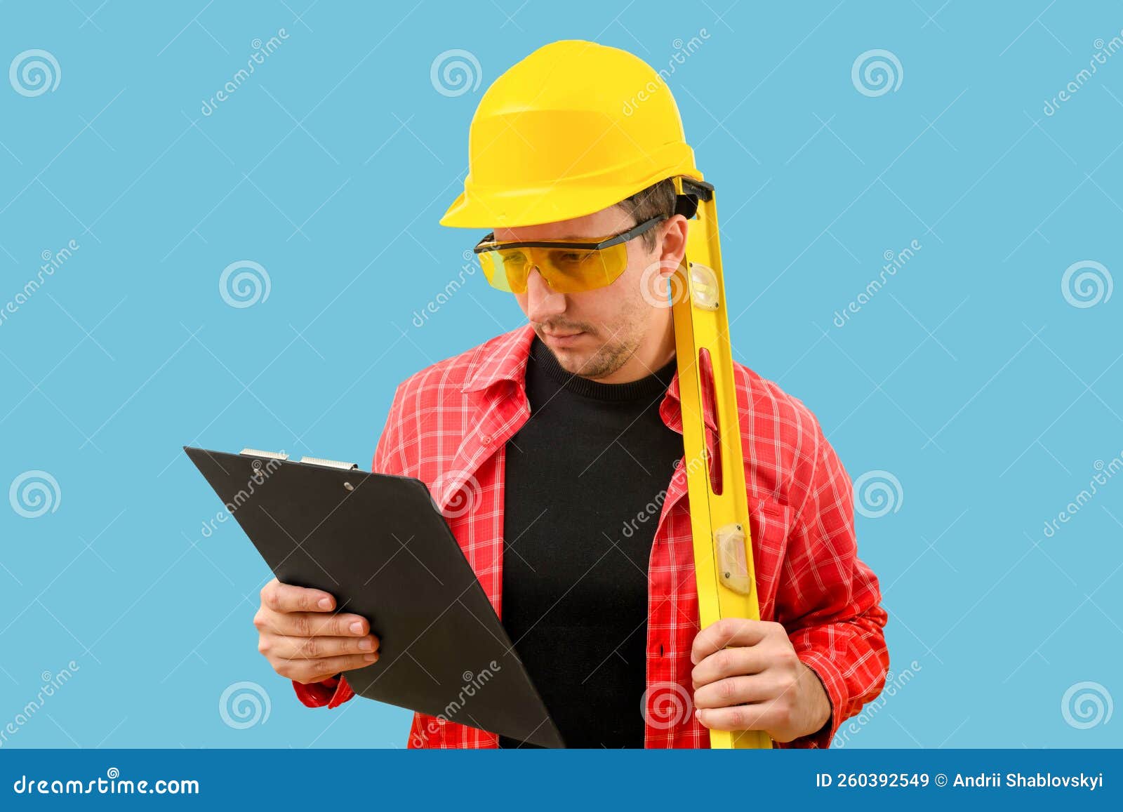 Builder or Worker with Clipboard on Blue Background. Construction