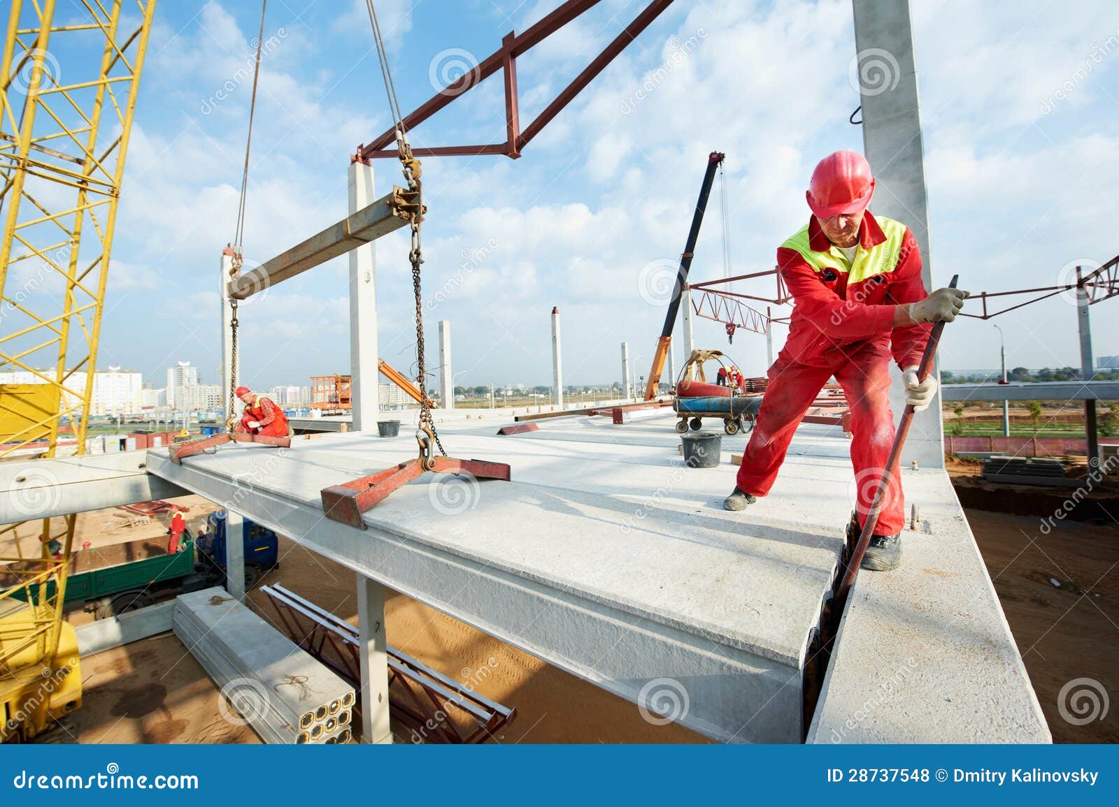 builder worker installing concrete slab
