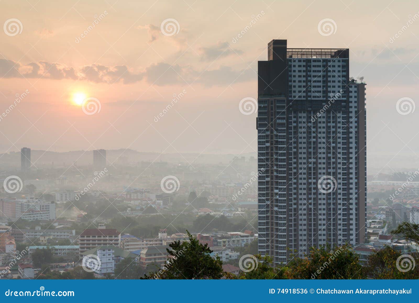 building with beautiful skyscrape during sunrise at pattaya city, thailand