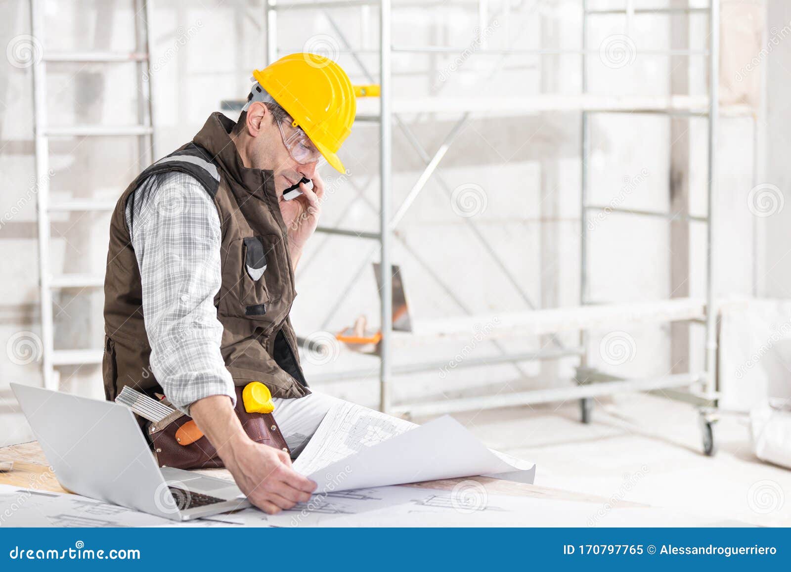 building contractor talking on a mobile phone