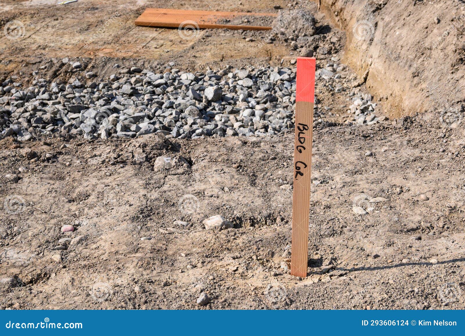 Building Corner Survey Marker, Base Dug Out of Leveled Dirt and Ready for Foundation