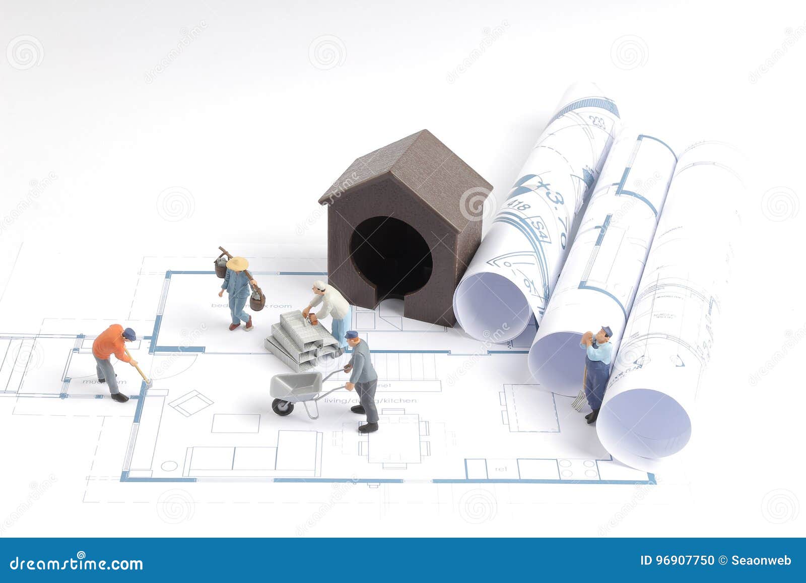 Building House On Blueprints With Worker Construction Stock Photo 