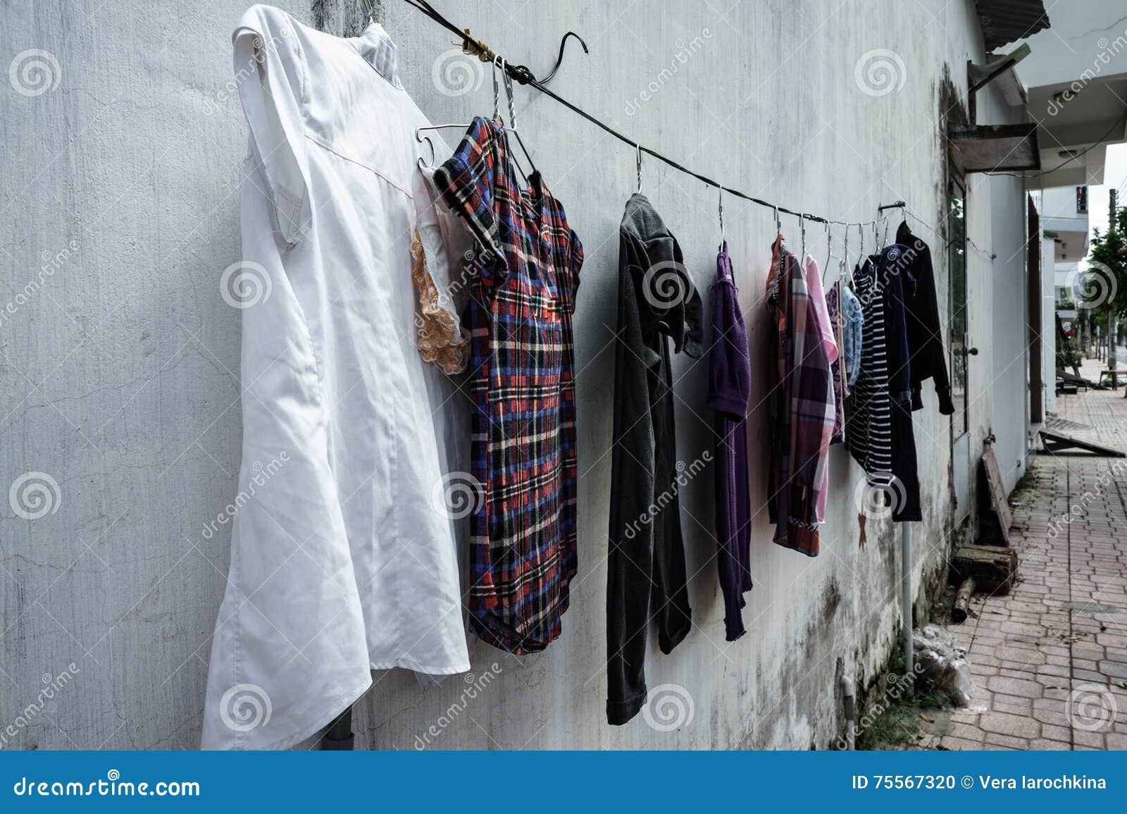 Building S Facade. Clothes Drying on a Rope. after Washing. Asia. Vietnam.  Stock Photo - Image of muzhchskaya, balcony: 75567320