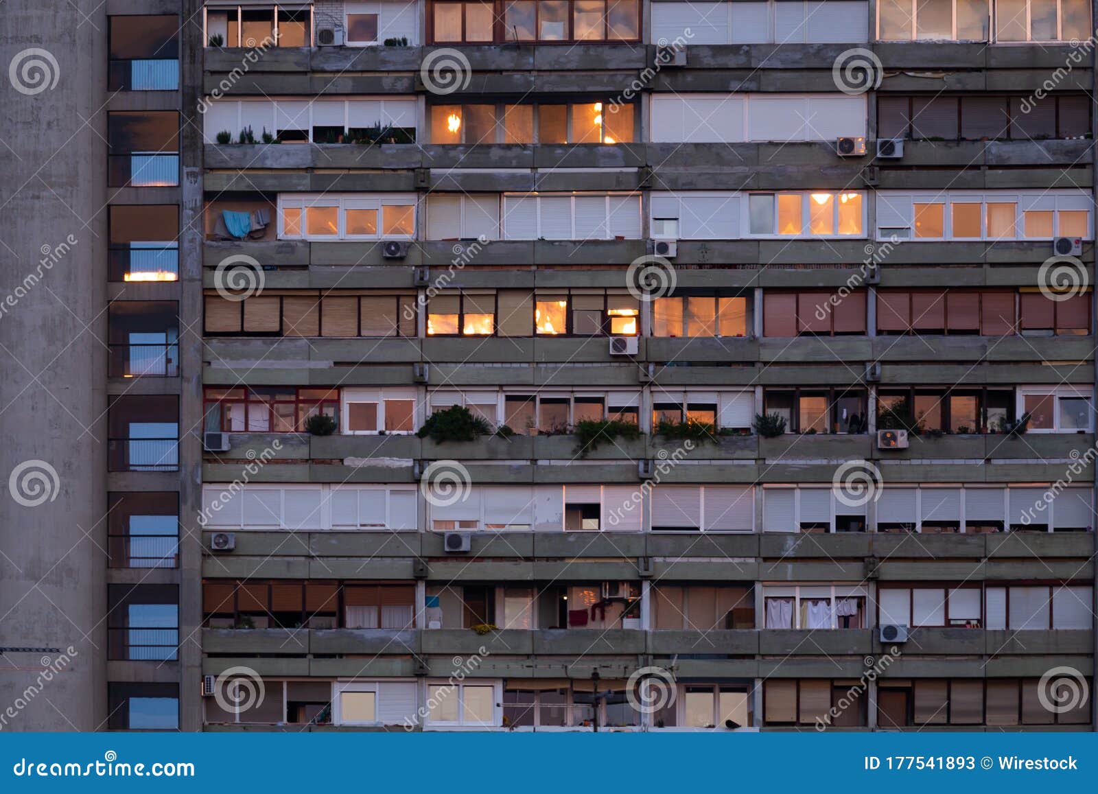 building with sun reflecting on windows. urban communist architecture in new zagreb