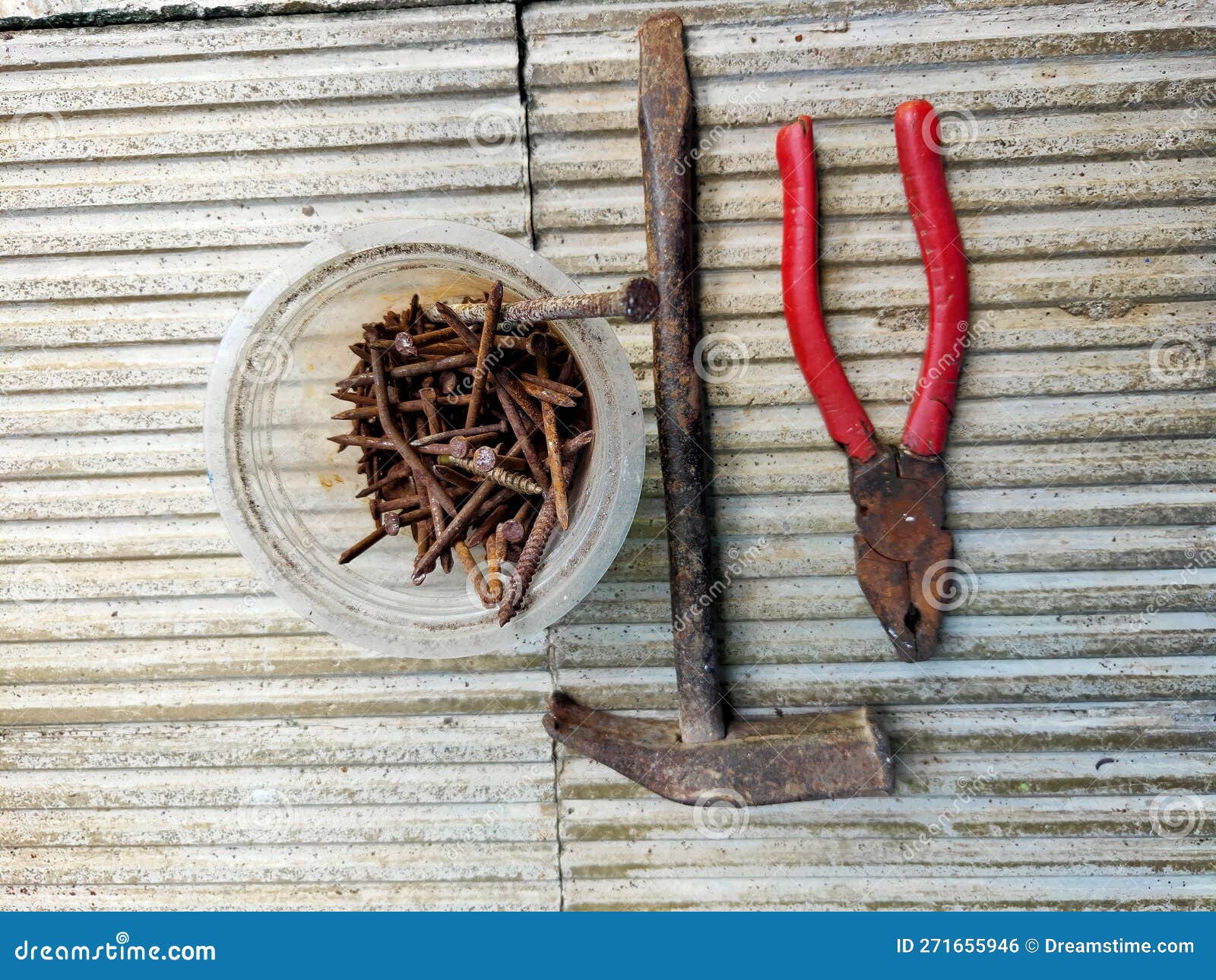 A Building Tool in the Form of Nails, Hammer, and Pliers Stock Photo Image of hammer, tool