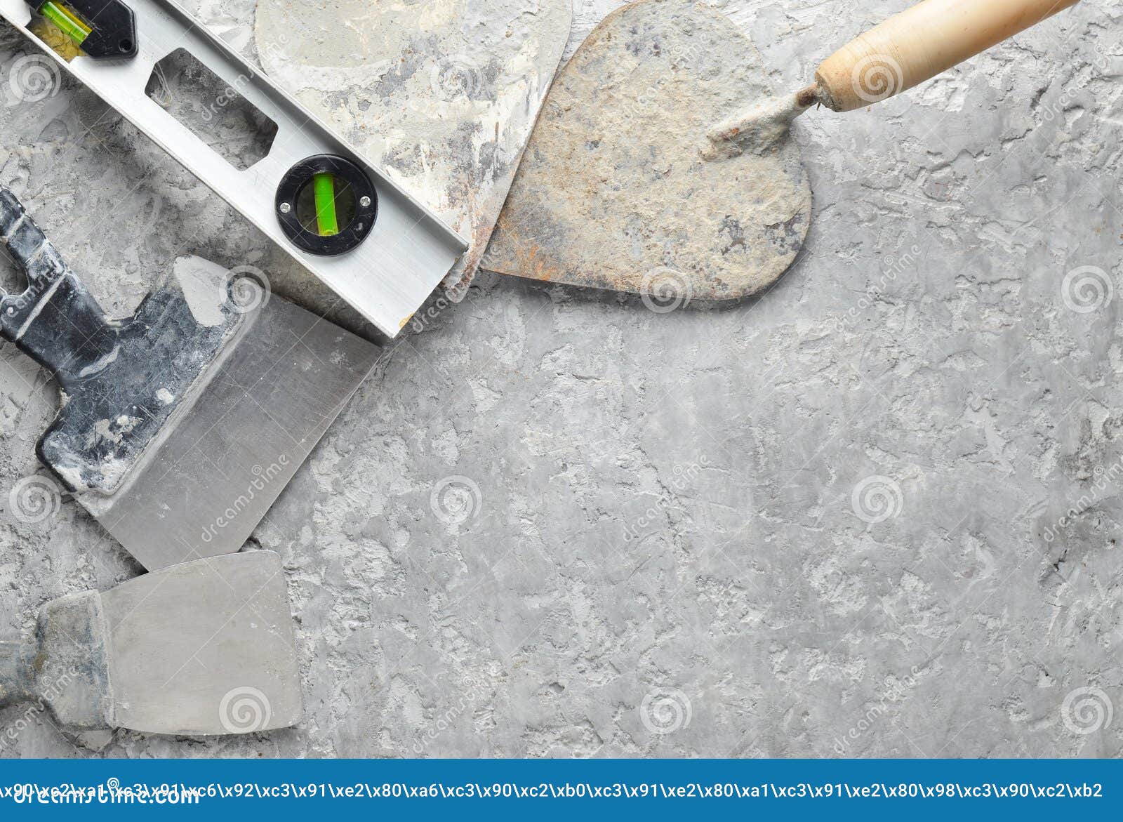 building tools on a gray concrete background