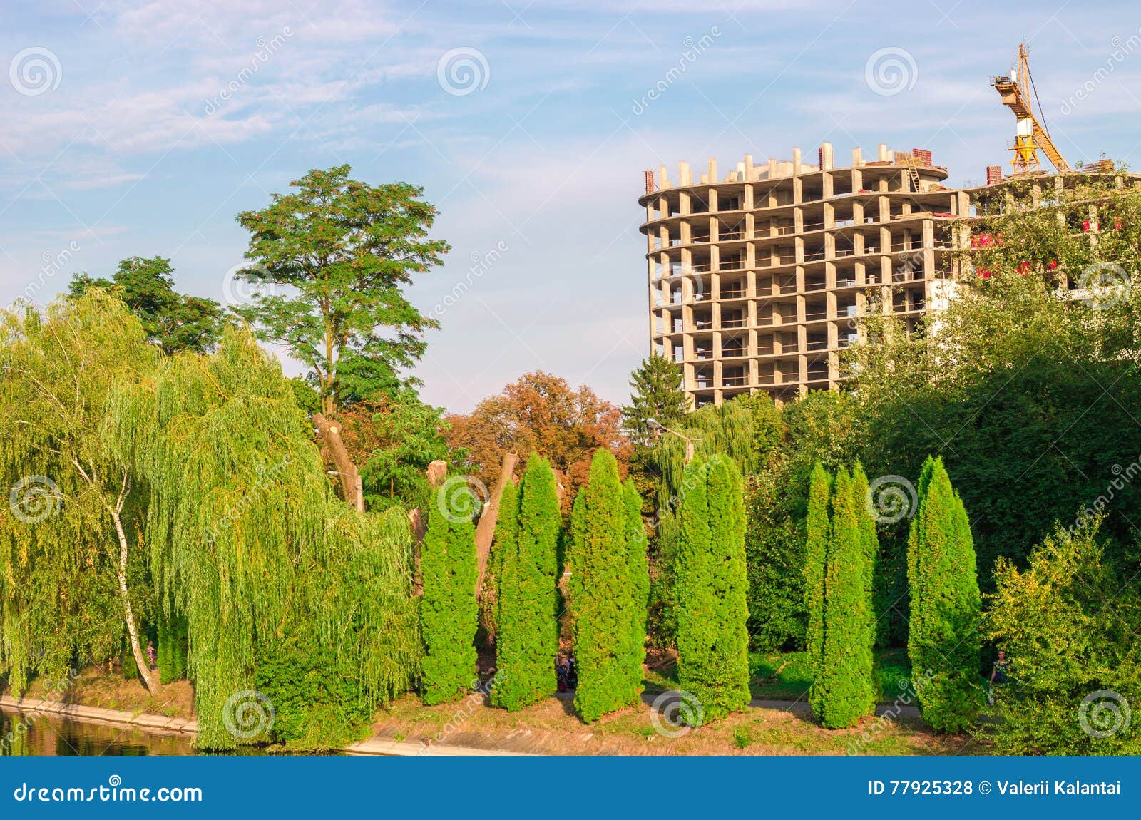 Building Under Construction on the Bank of Big Lake. Stock Photo