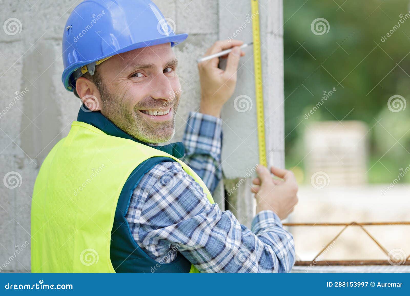 Building Worker Measuring Wall Construction Site Stock Image Image of