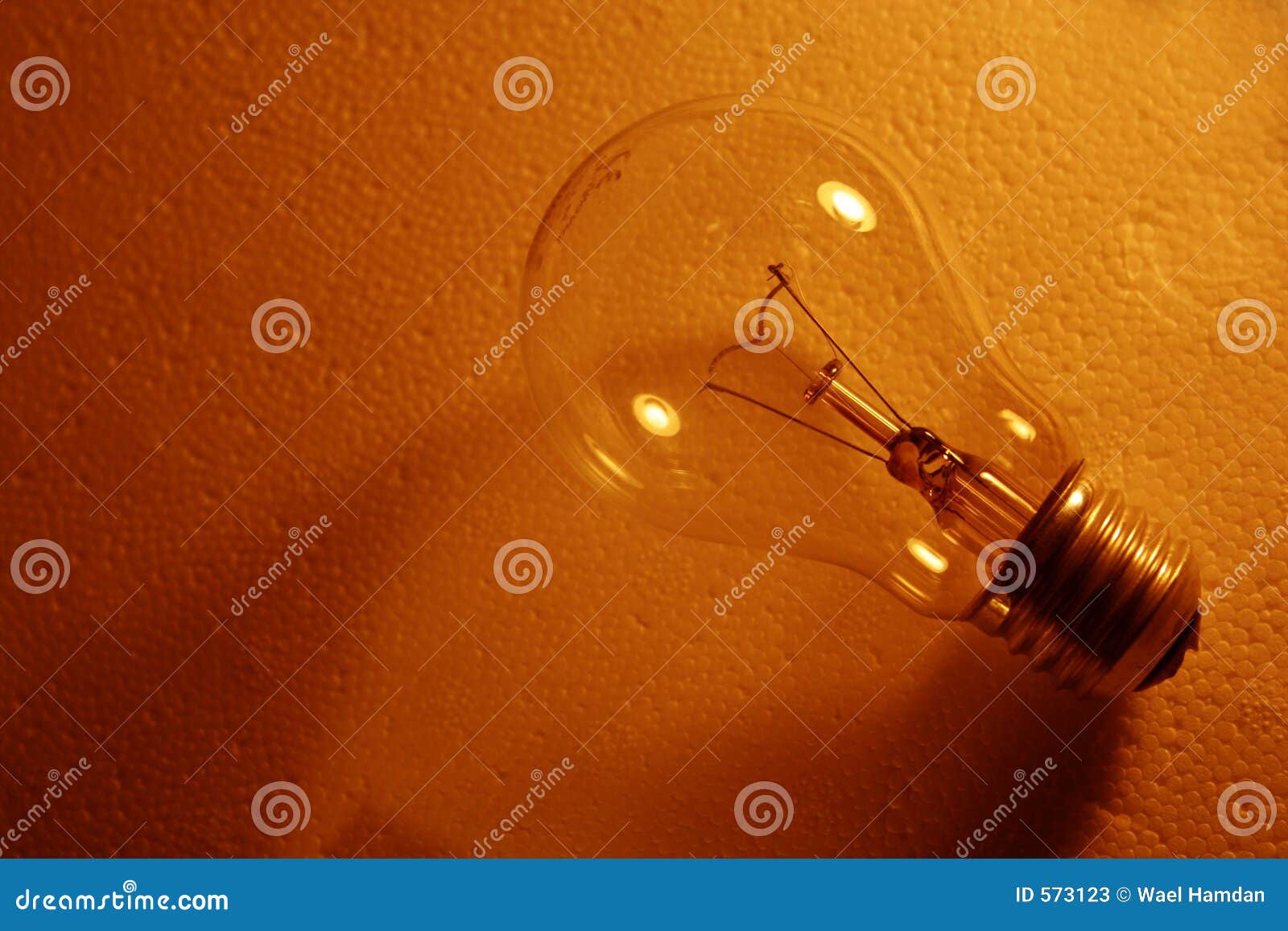 Bulb in brown stock image. Image of electrical, helping 573123