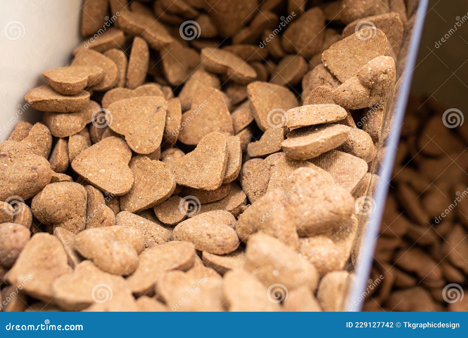 Bulk Bin Dog Treats at a Pet Store. Bin Full of Dog Biscuits Stock