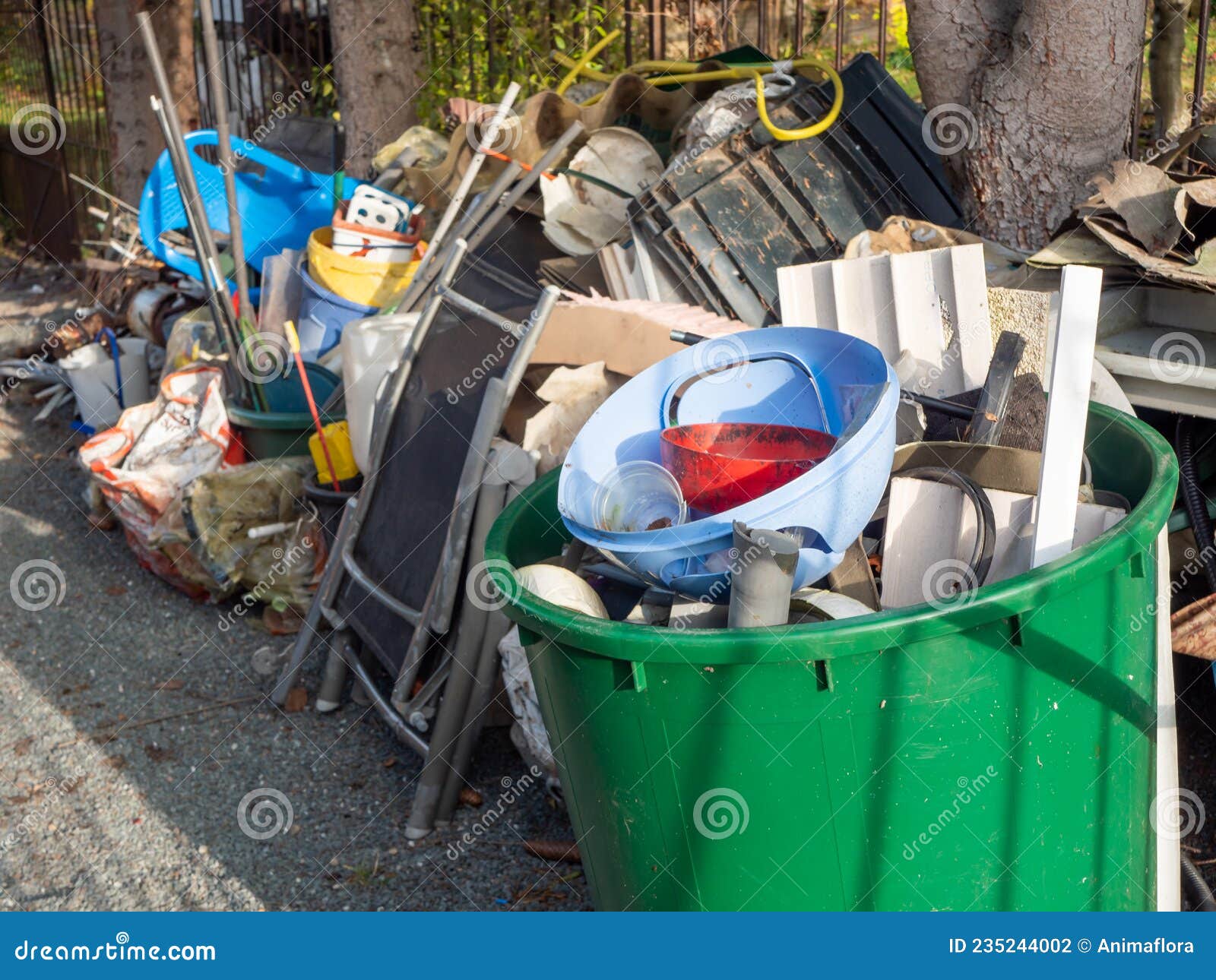 Bulky Waste On The Street. Broken Beds, Garbage Furniture On Pavement