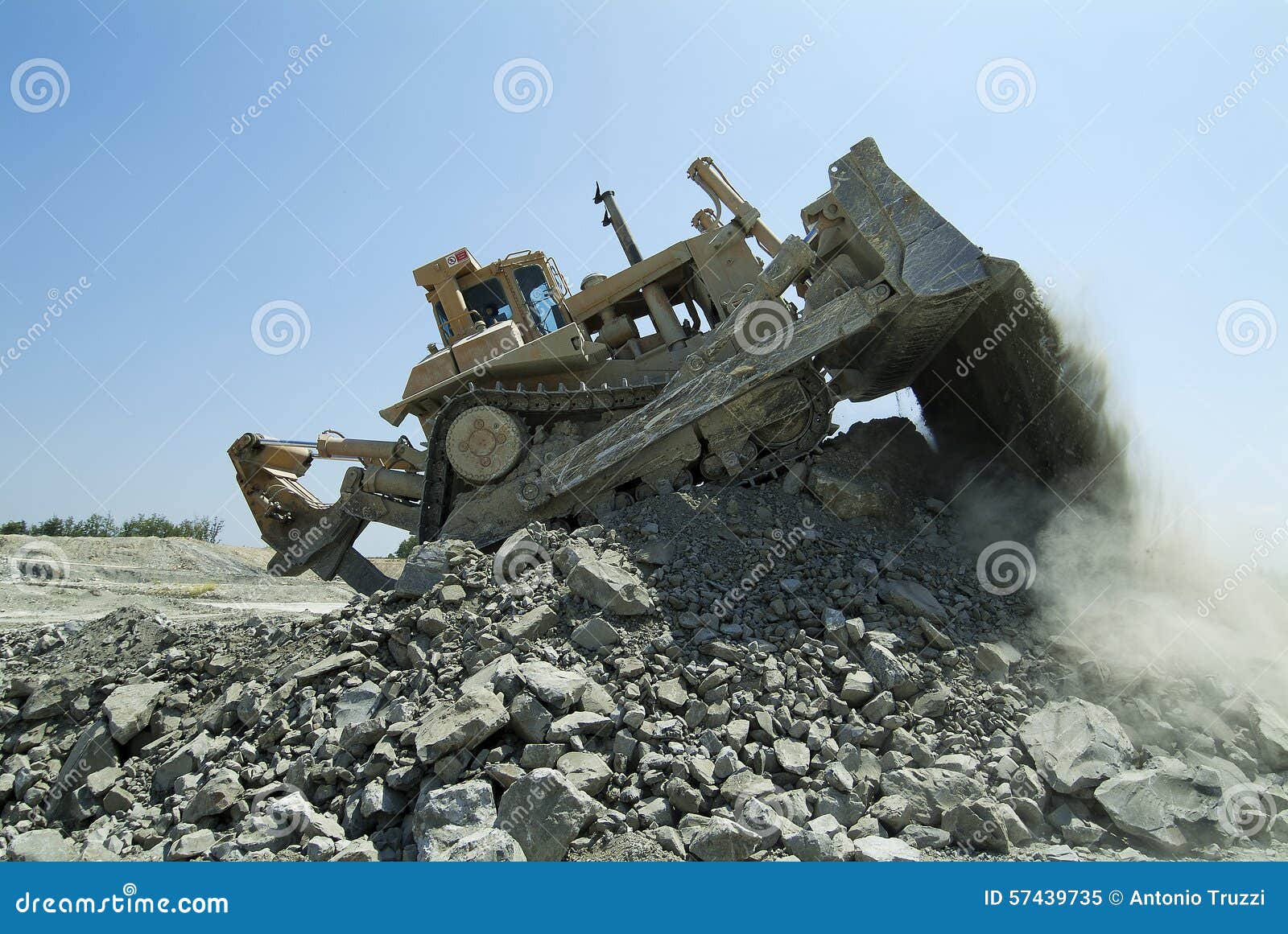 Dozer On Earthmoving At Construction Site On Sunset Background ...