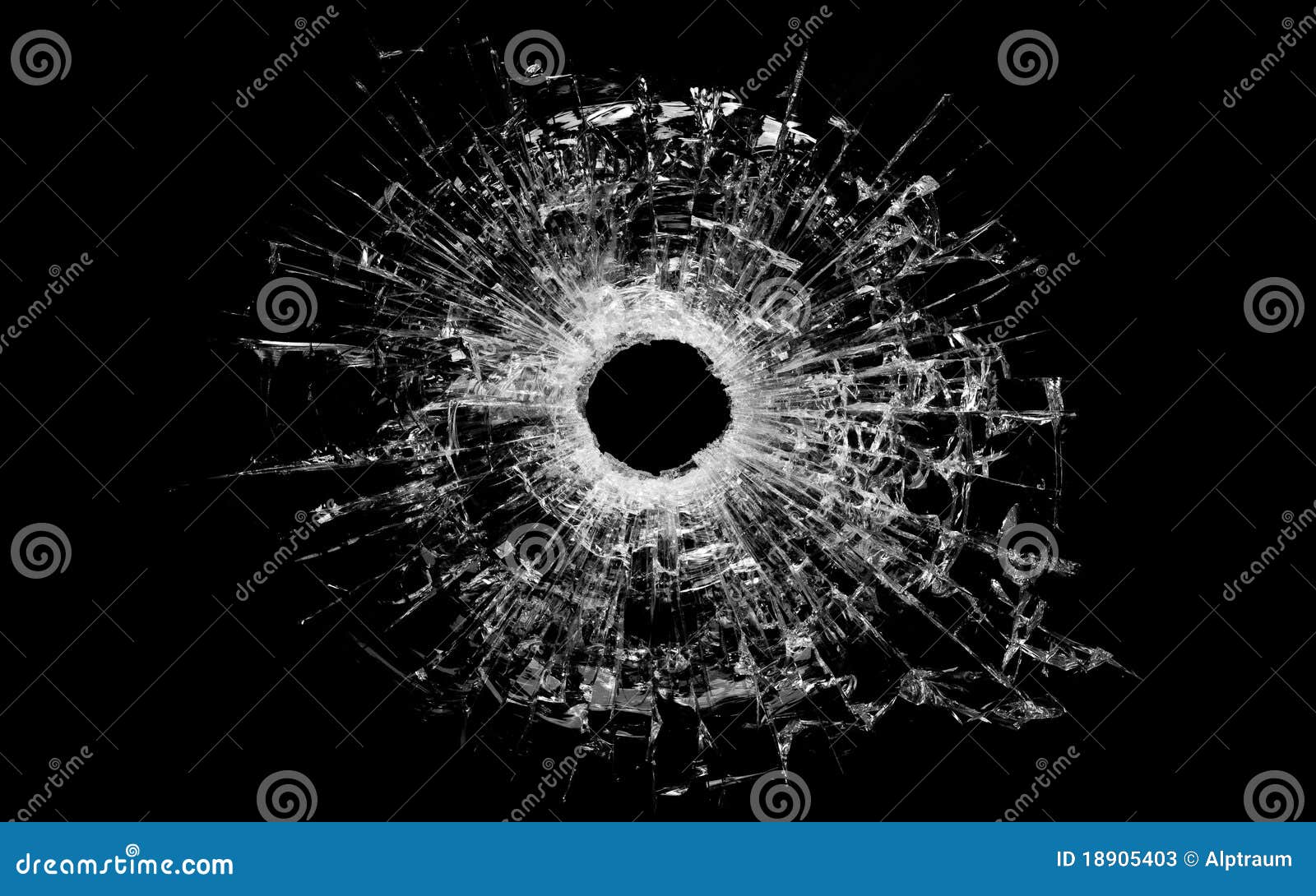 bullet hole in glass  on black