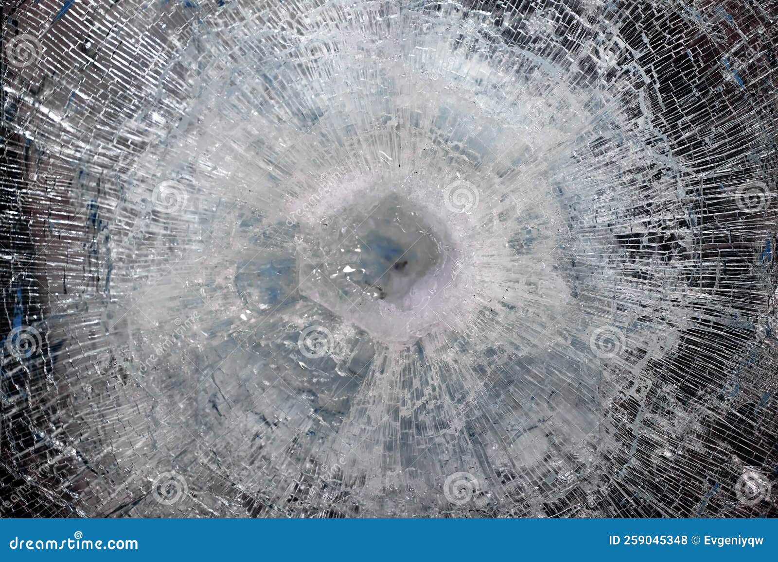 Bulletproof Glass after Test. Bulletproof Glass with Cracks and a