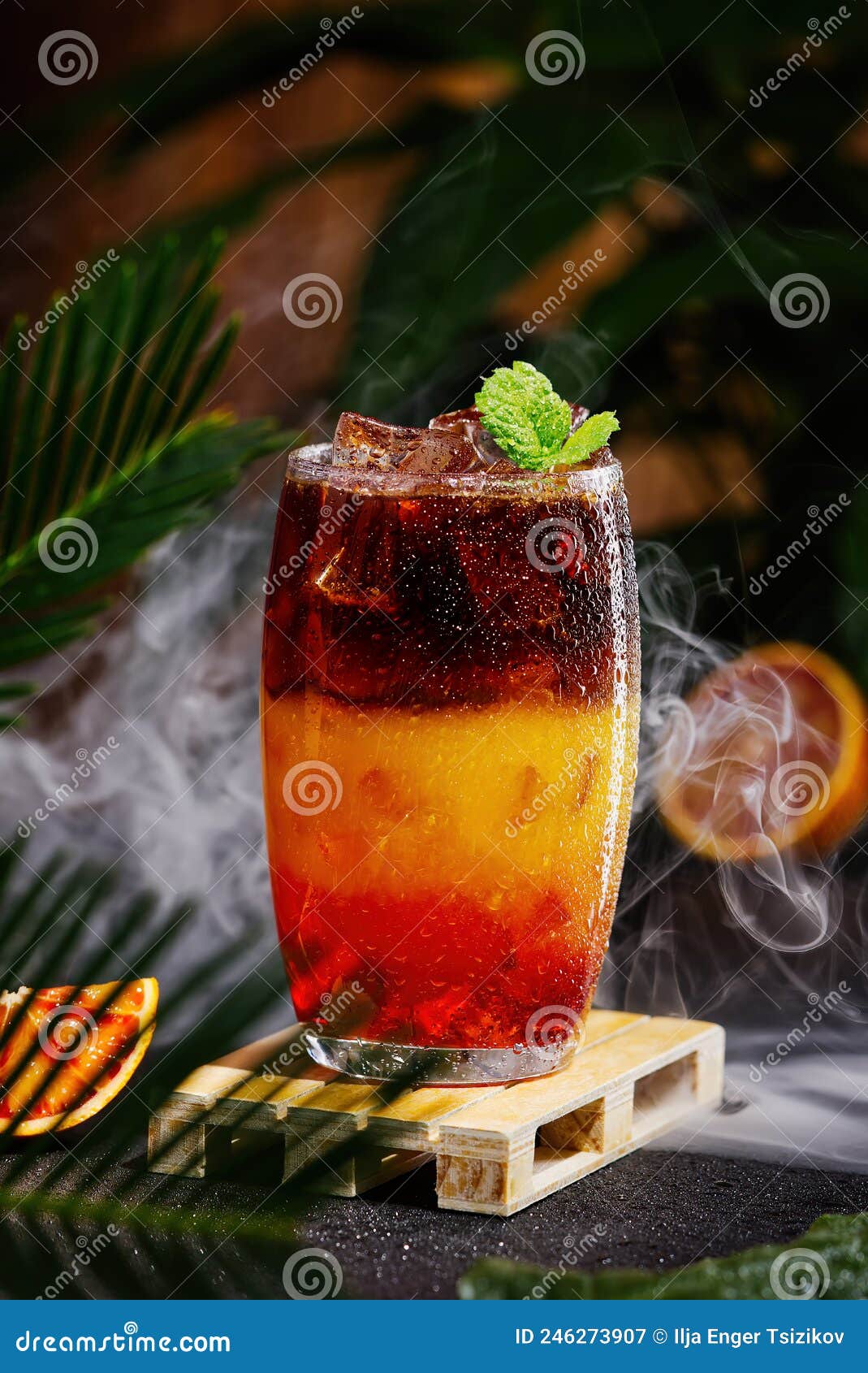 Bumble Coffee with Ice on a Dark Tropical Background. Espresso, Orange
