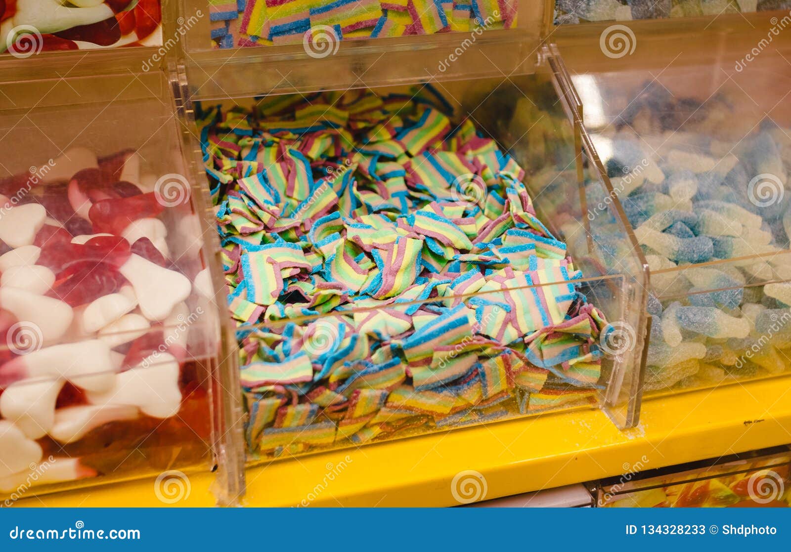 Bunch of Assorted Gummy Candies on Boxes in Supermarket Stock Image