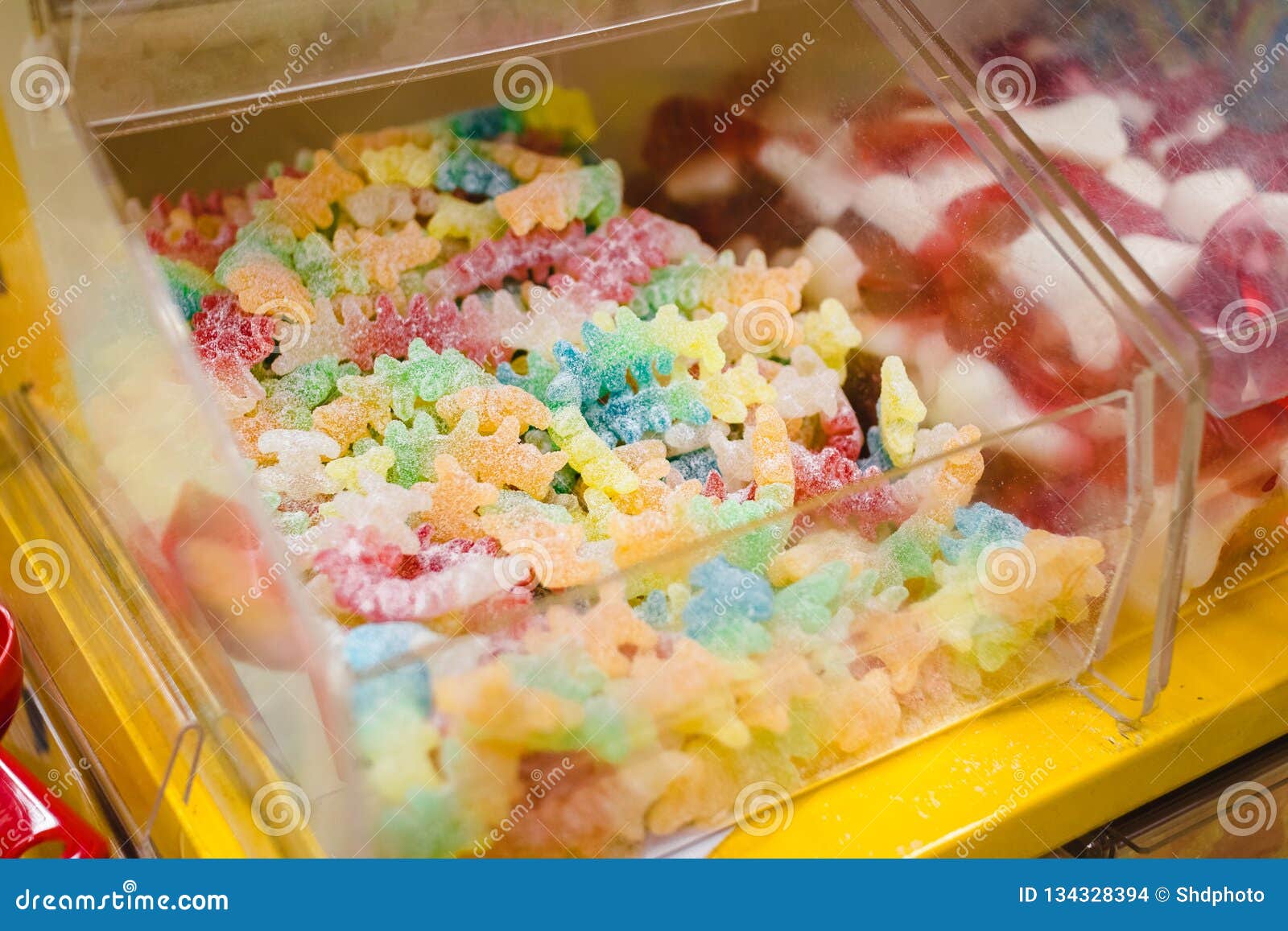 Bunch of Assorted Gummy Candies on Boxes in Supermarket Stock Photo
