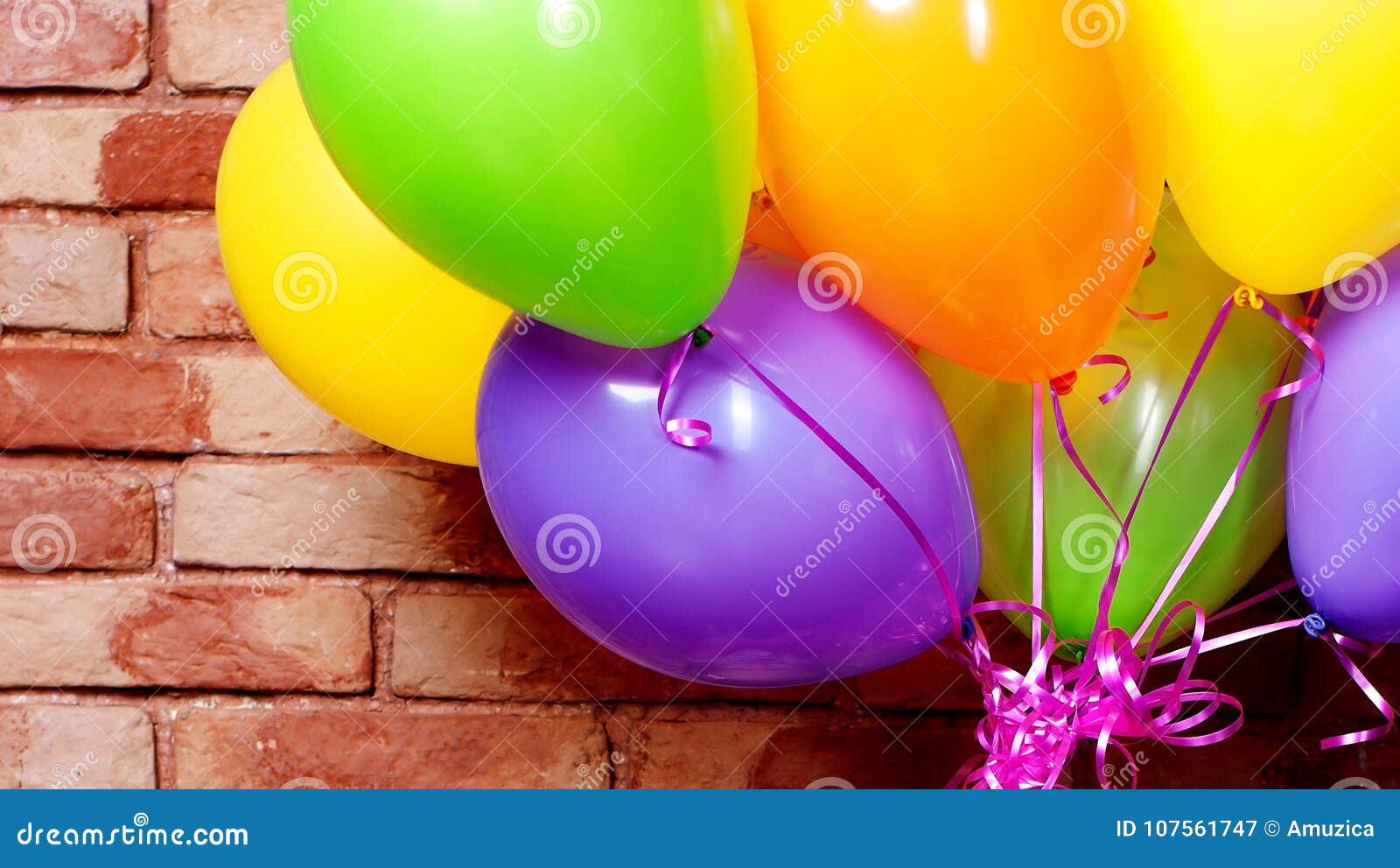 bunch of colorful helium balloons