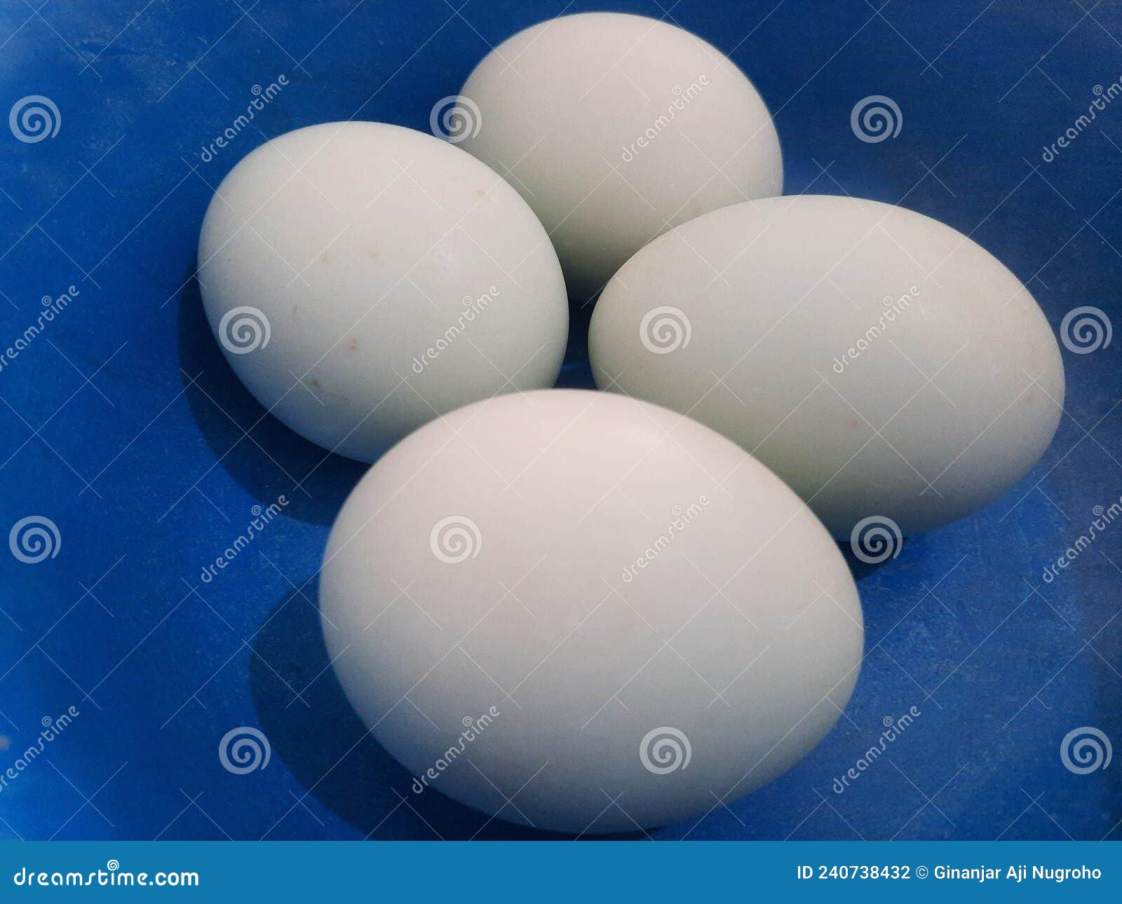 a bunch of duck eggs in a bowl