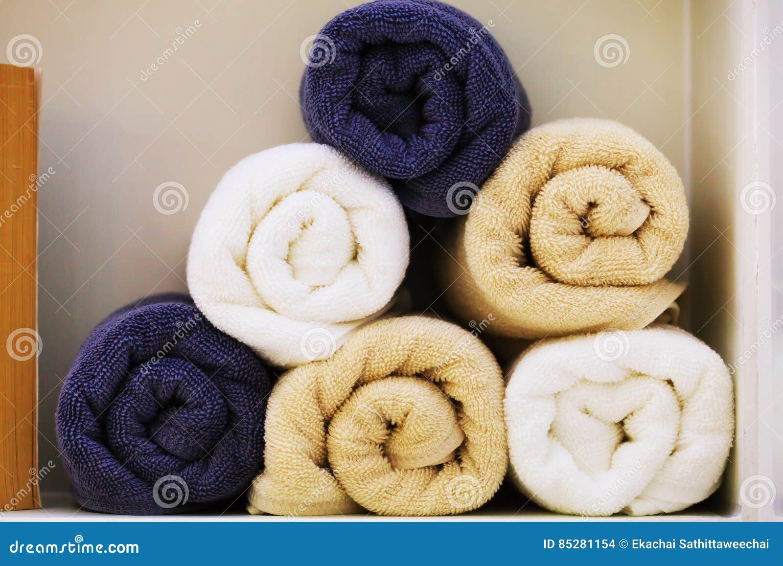 Bunch of Earth Tone Towels in Bathroom Shelf Stock Photo Image of
