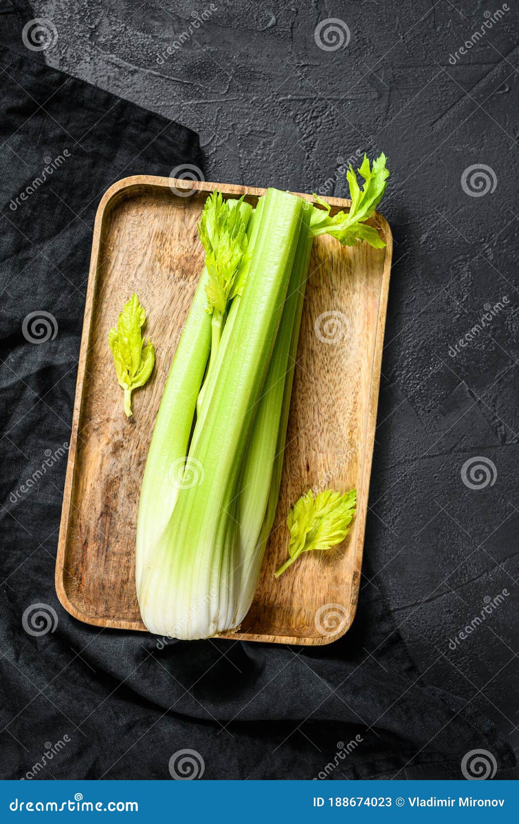 Bunch of Fresh Celery Stalk with Leaves. Black Background Stock Image
