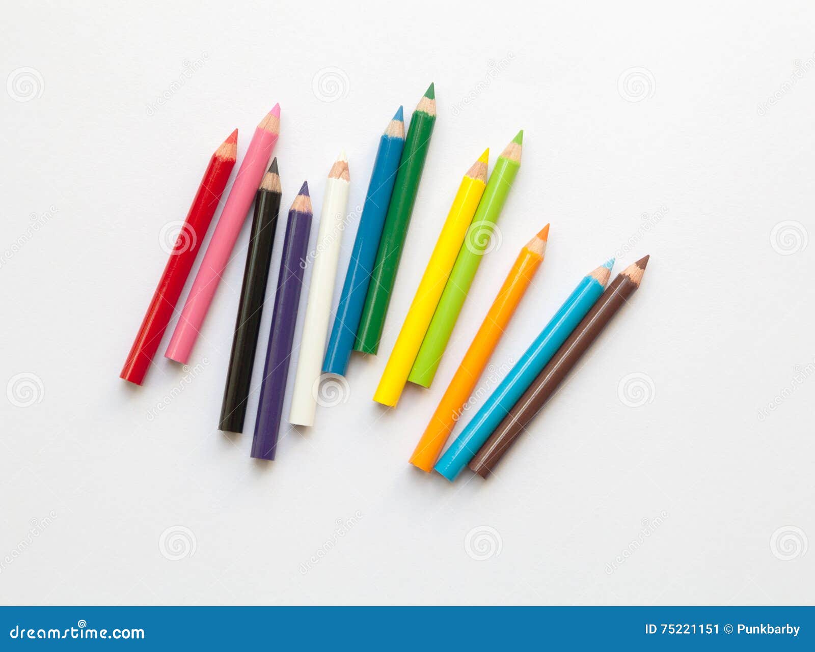 bunch of fun mini colored pencils  on white. multicolor group of wooden pencils