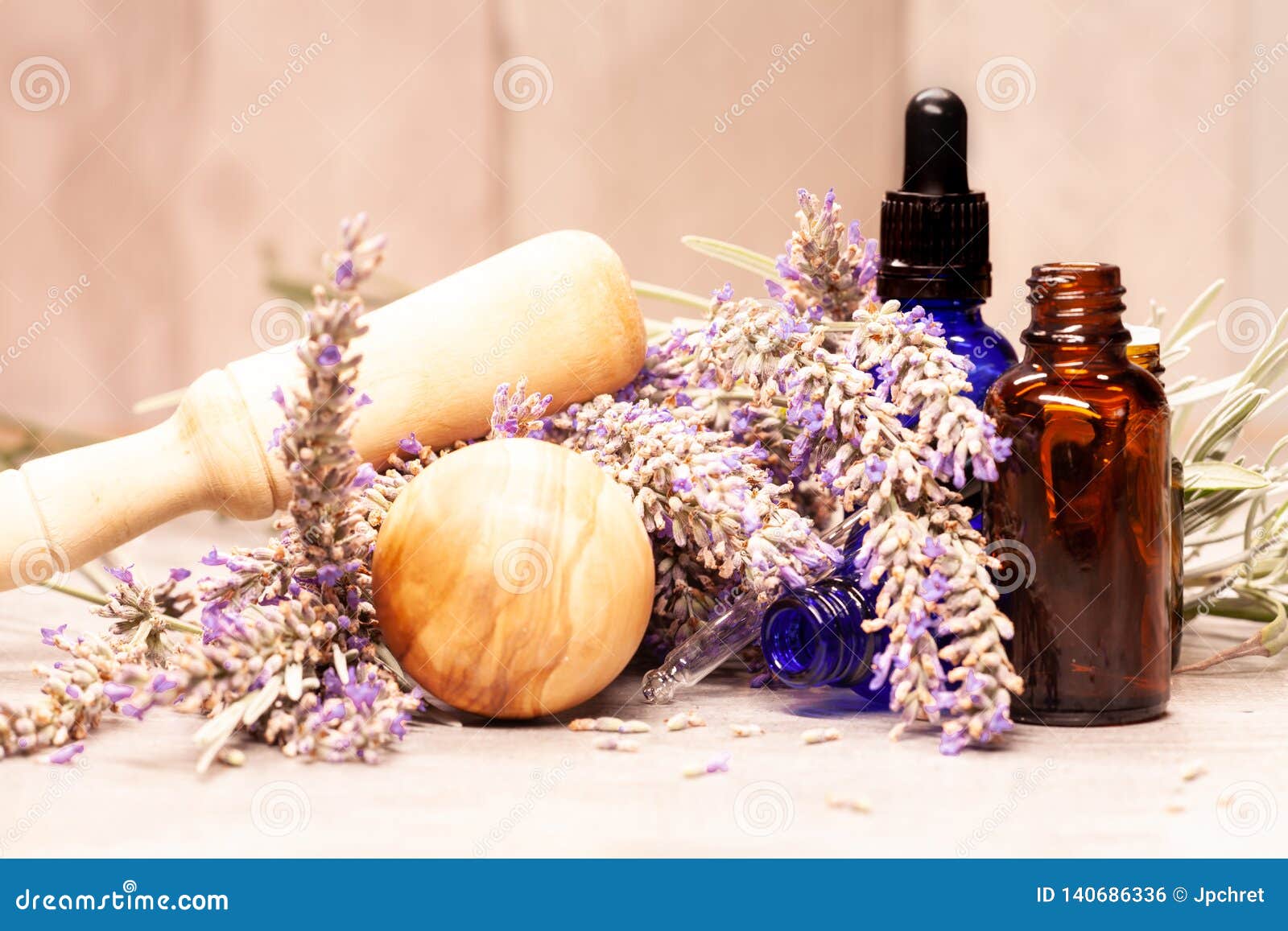 Bunch Lavender Mortar and Pestle and Bottles of Essential Oils for