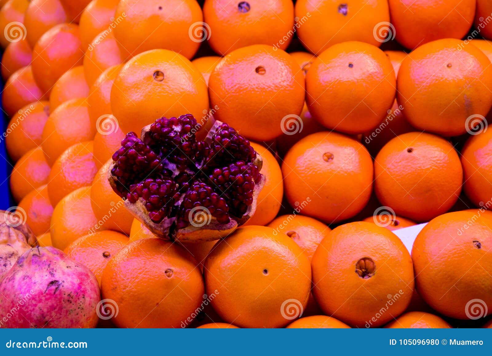 oranges and pomagranade on the market place