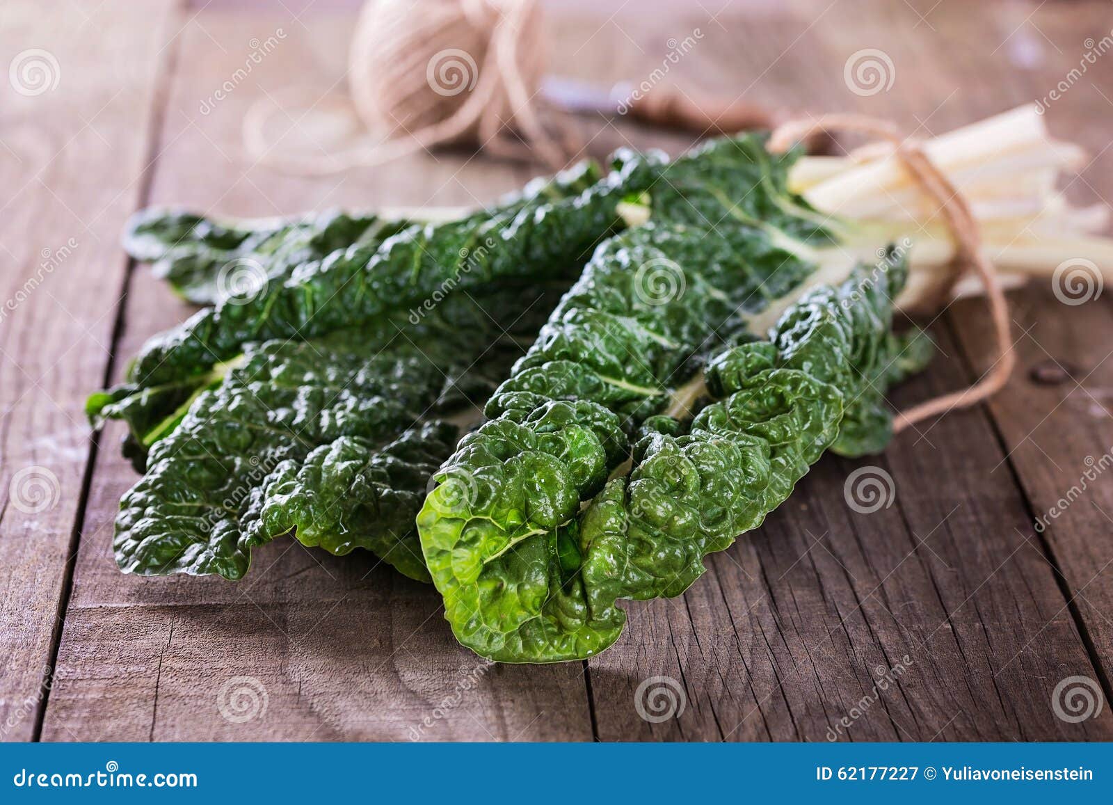 bunch of silverbeet on a rustic wooden background close up