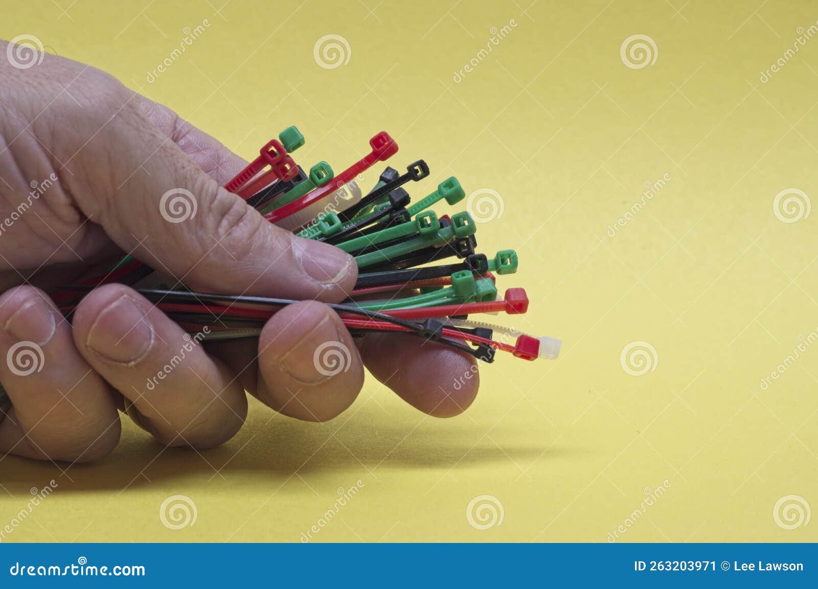 A Bundle of Zip Ties Held in Hand Stock Image Image of bright, tools