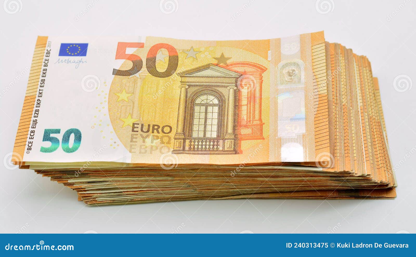 bundles of 50 euro banknotes,  on white