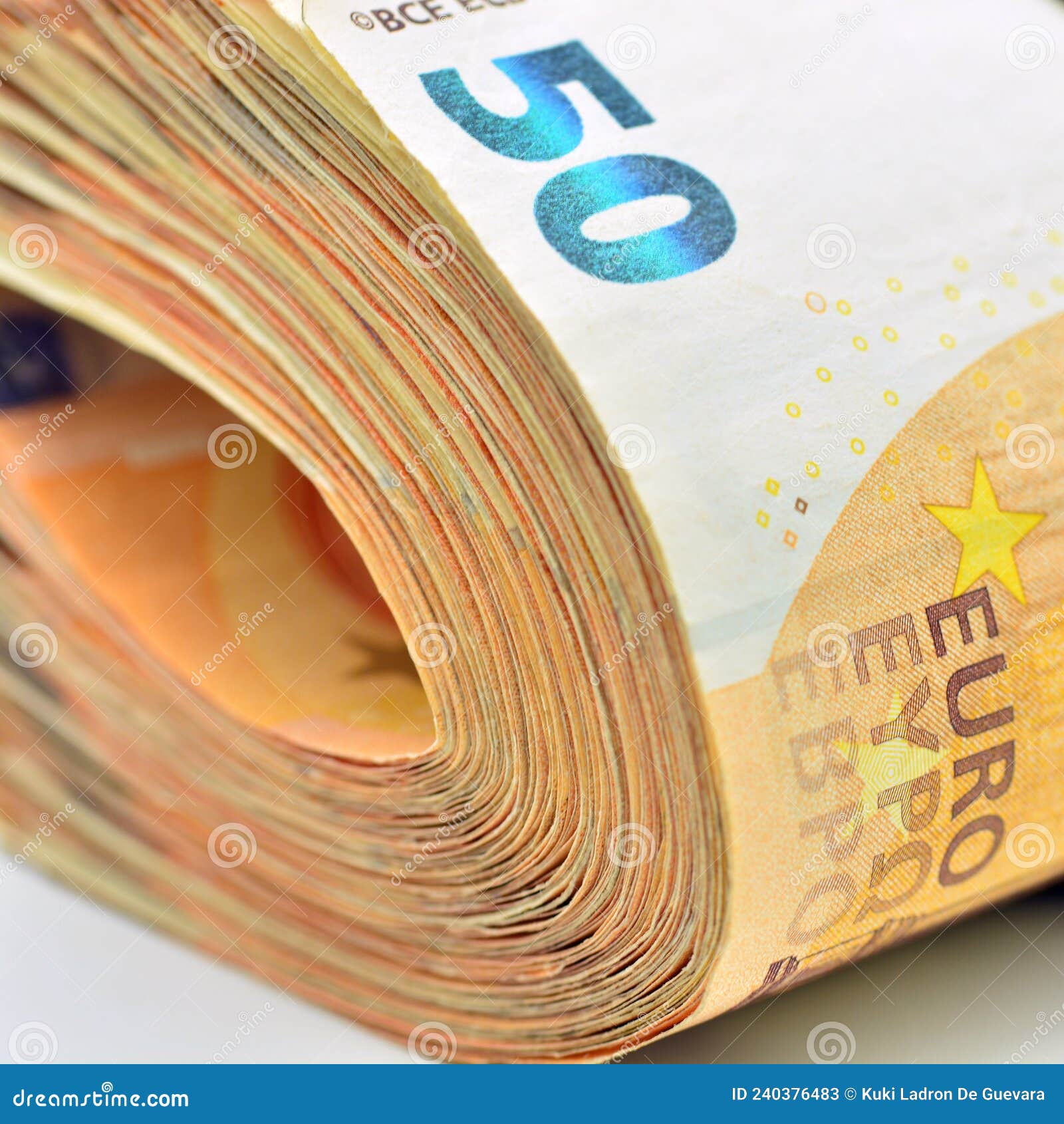 bundles of 50 euro banknotes,  on white