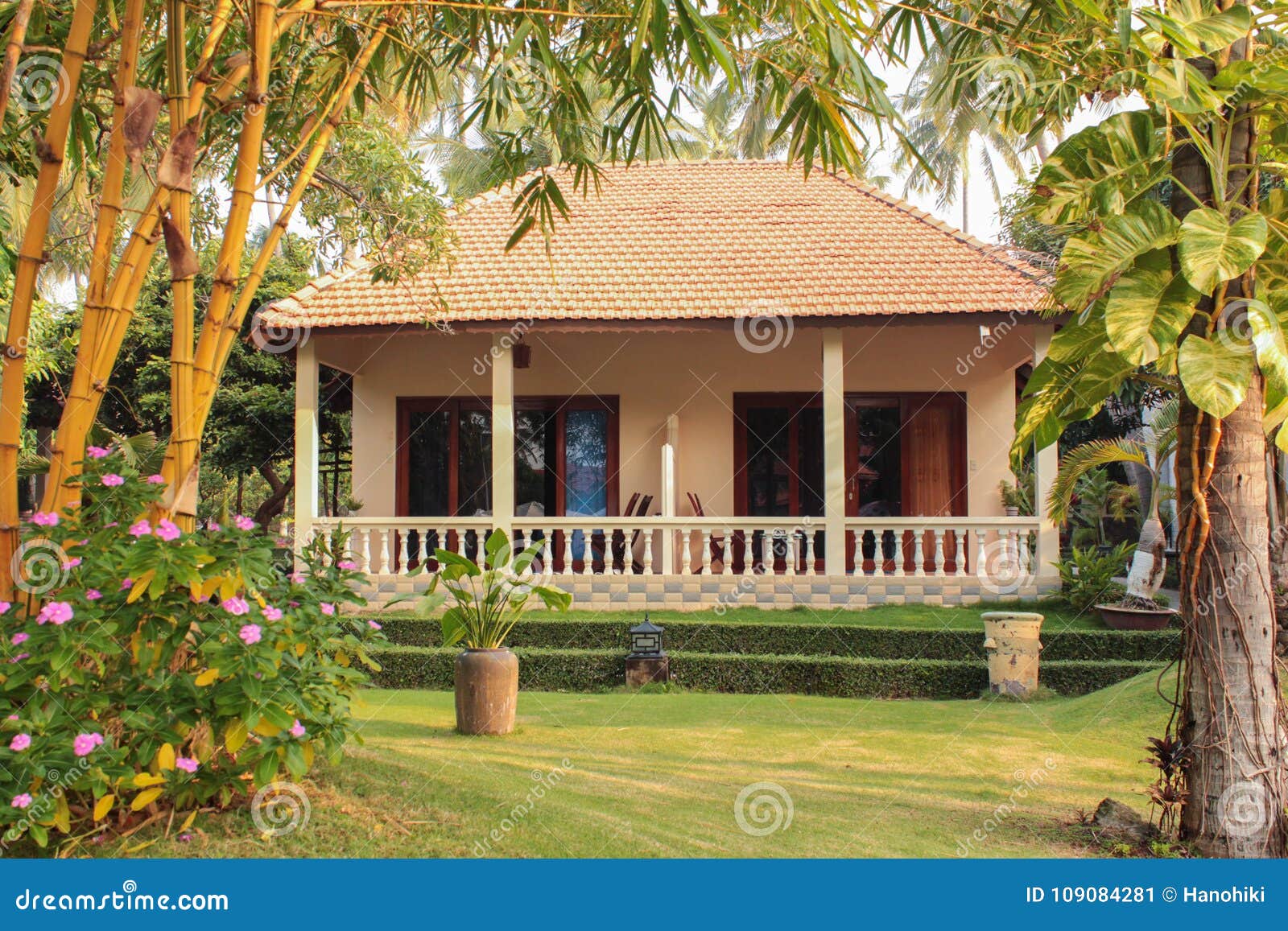 Bungalow And Garden Apartment House In Tropical Garden Stock