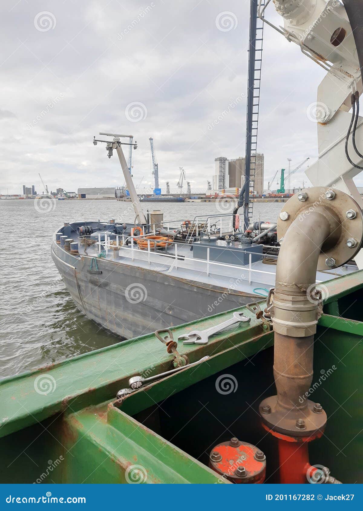 bunkering tanker container ship in port close up
