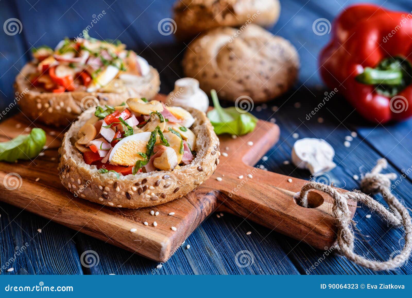 Buns Stuffed with Mushrooms, Bell Pepper, Eggs and Bacon Stock Image