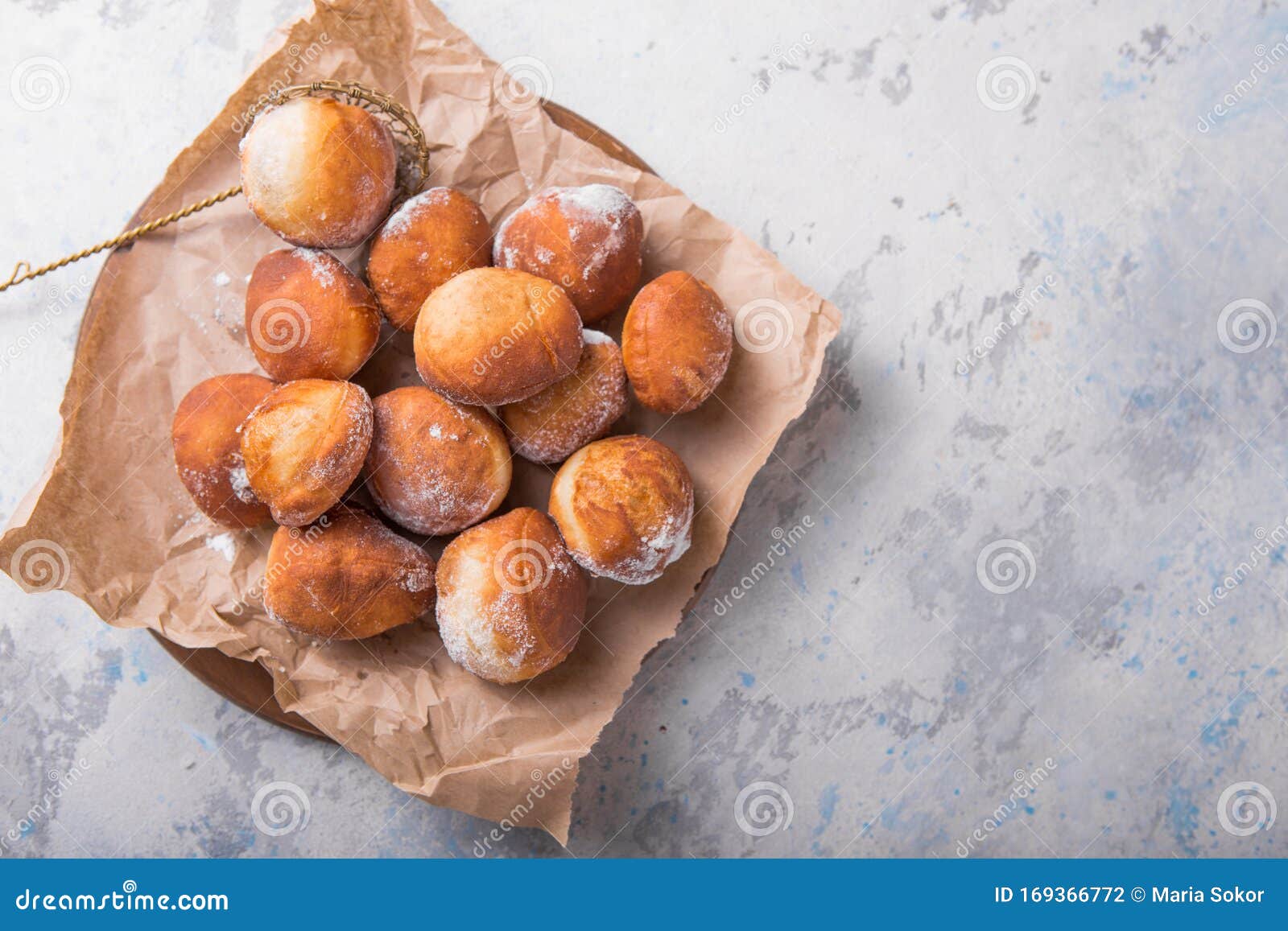bunuelos mexican fritters golden, crispy-sweet, tortilla-like fritters. pile of bunyols de quaresma, typical pastries of