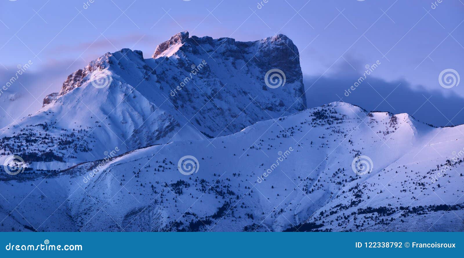 bure peak pic de bure in the devoluy mountain range at dusk in winter. hautes-alpes, alps, france