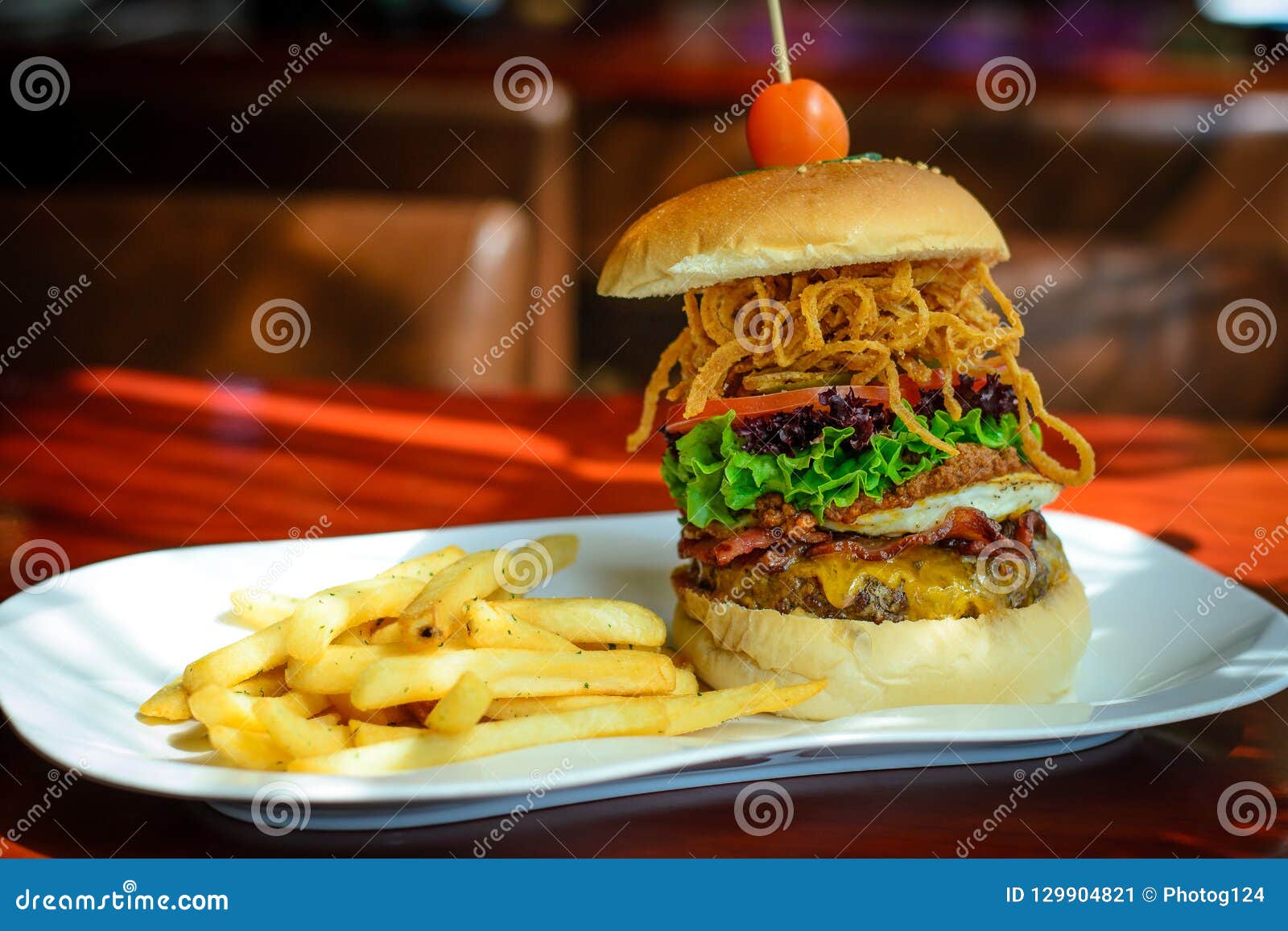 A Burger with Beef Patty and Bacon and Cheddar Cheese and Egg, Chilli