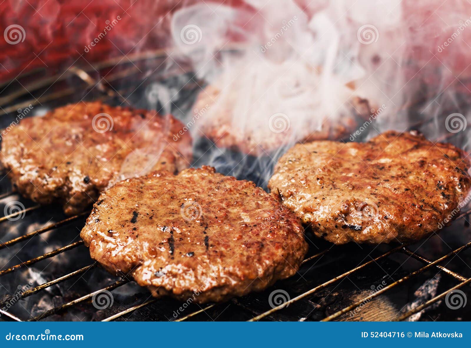 Burger patties on a grill stock photo. Image of burgers 52404716