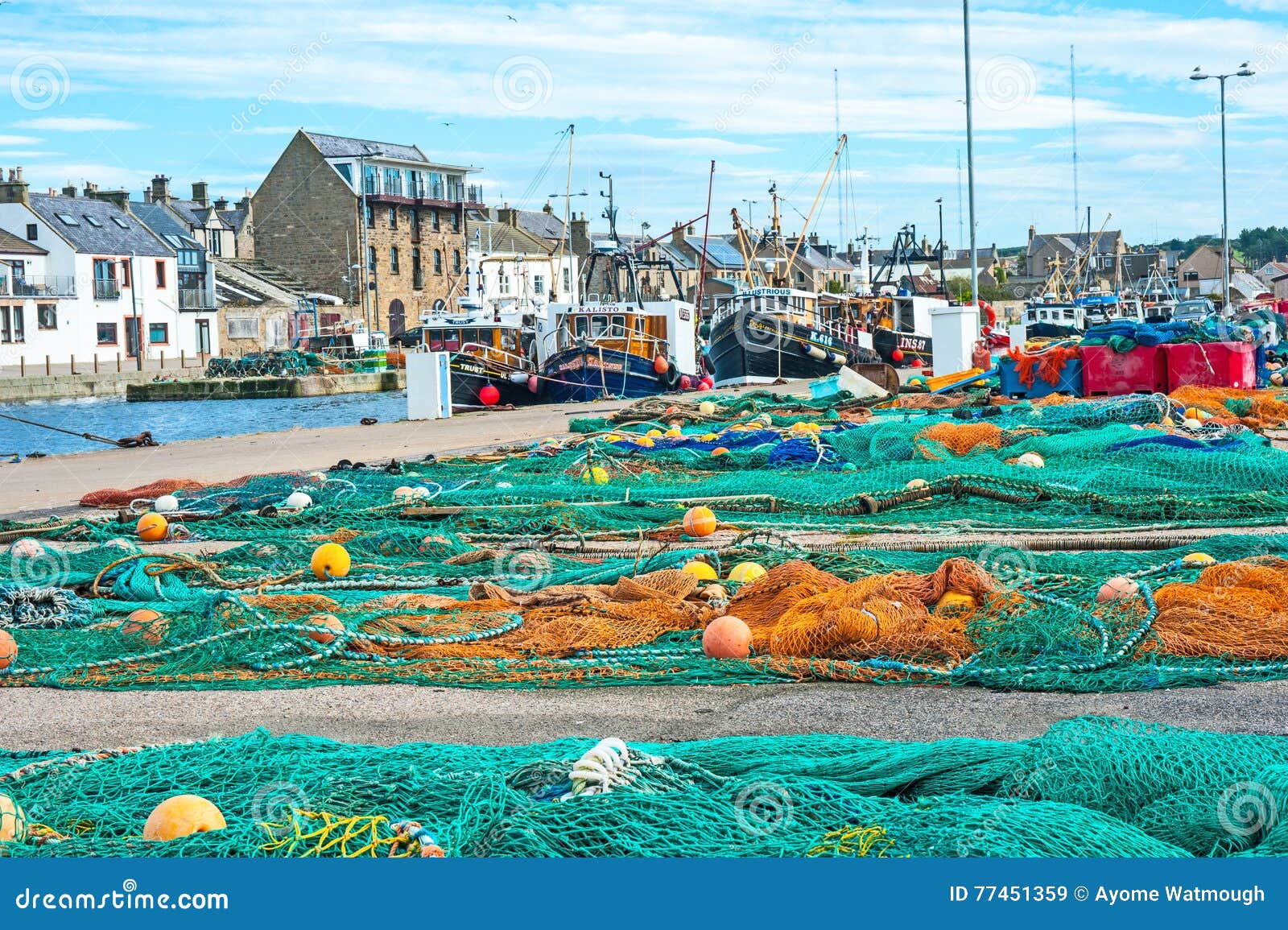 burghead harbor with fishing boats editorial stock image