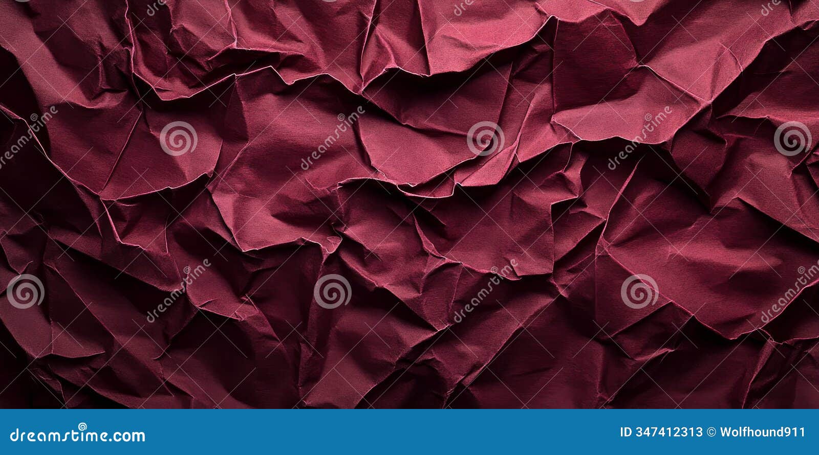 burgundy crumpled paper texture with rich wine-colored tones. bold folds and deep shadows emphasize