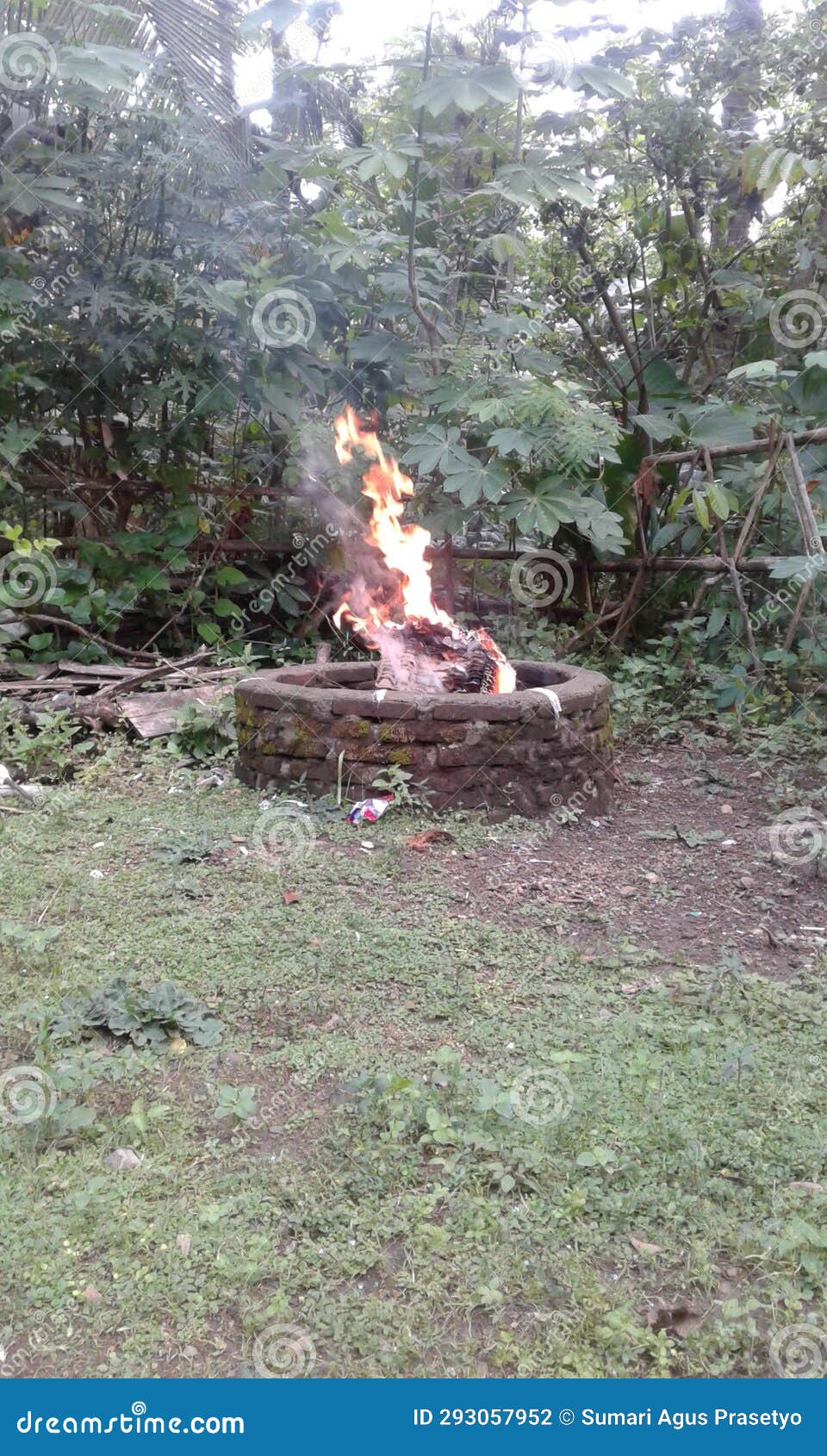 Burn rubbish in brick bins stock photo. Image of soil 293057952