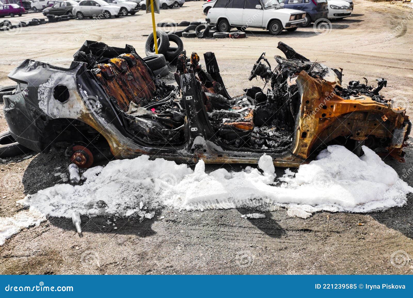 Burnedout Car after Arson Accident. Melted Plastic in a Fire. Stock