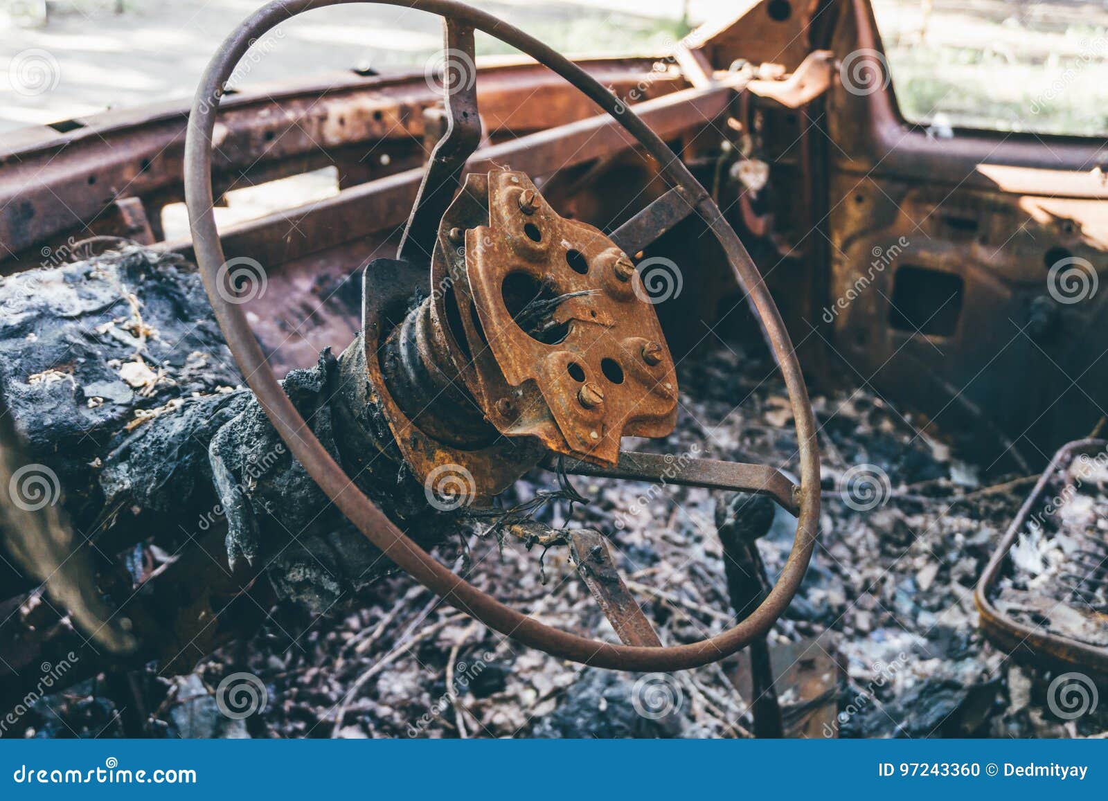 Burned Out Car, Inside View, Rusty Steering Wheel, Stock Photo Image