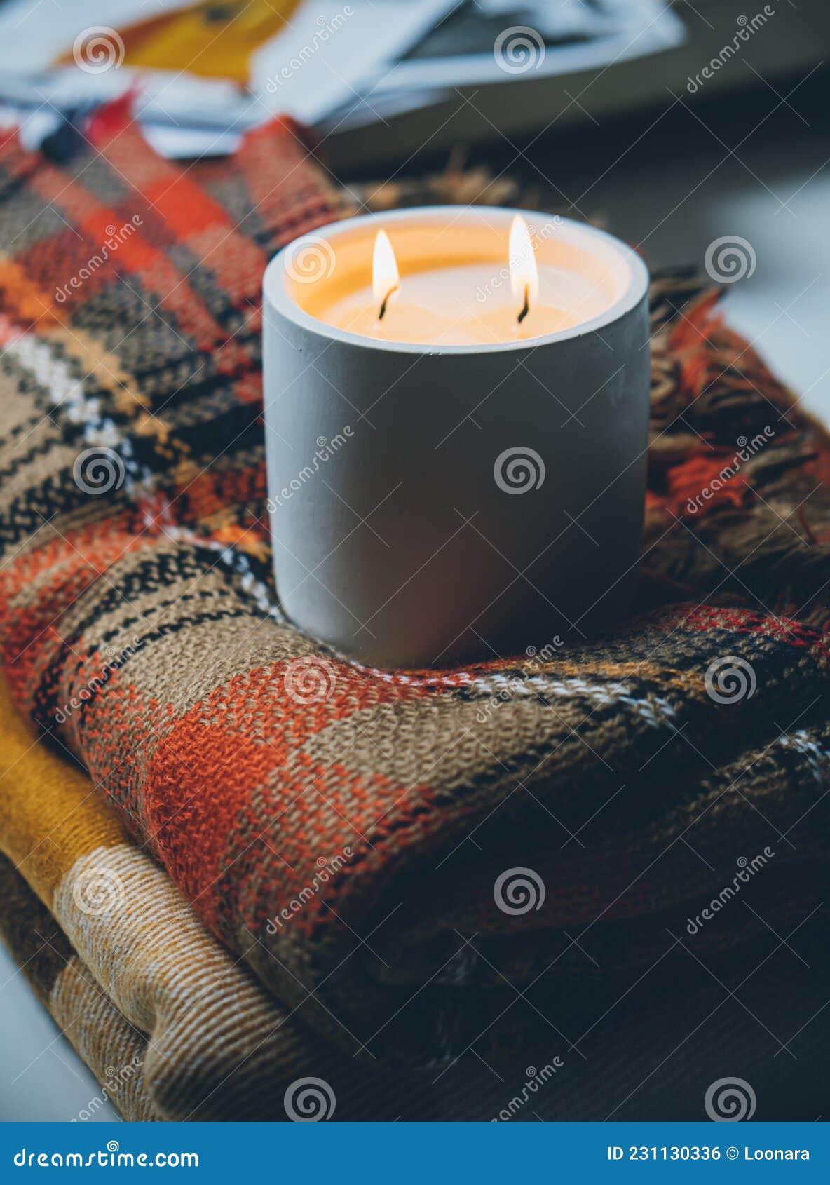Burning Candle with Two Wicks, Handmade Candle in White Jar Stock Photo