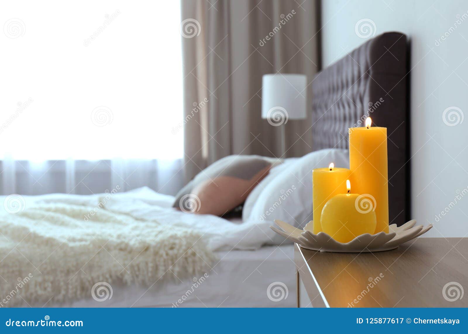 Burning Candles on Bedside Table Stock Image Image of atmosphere