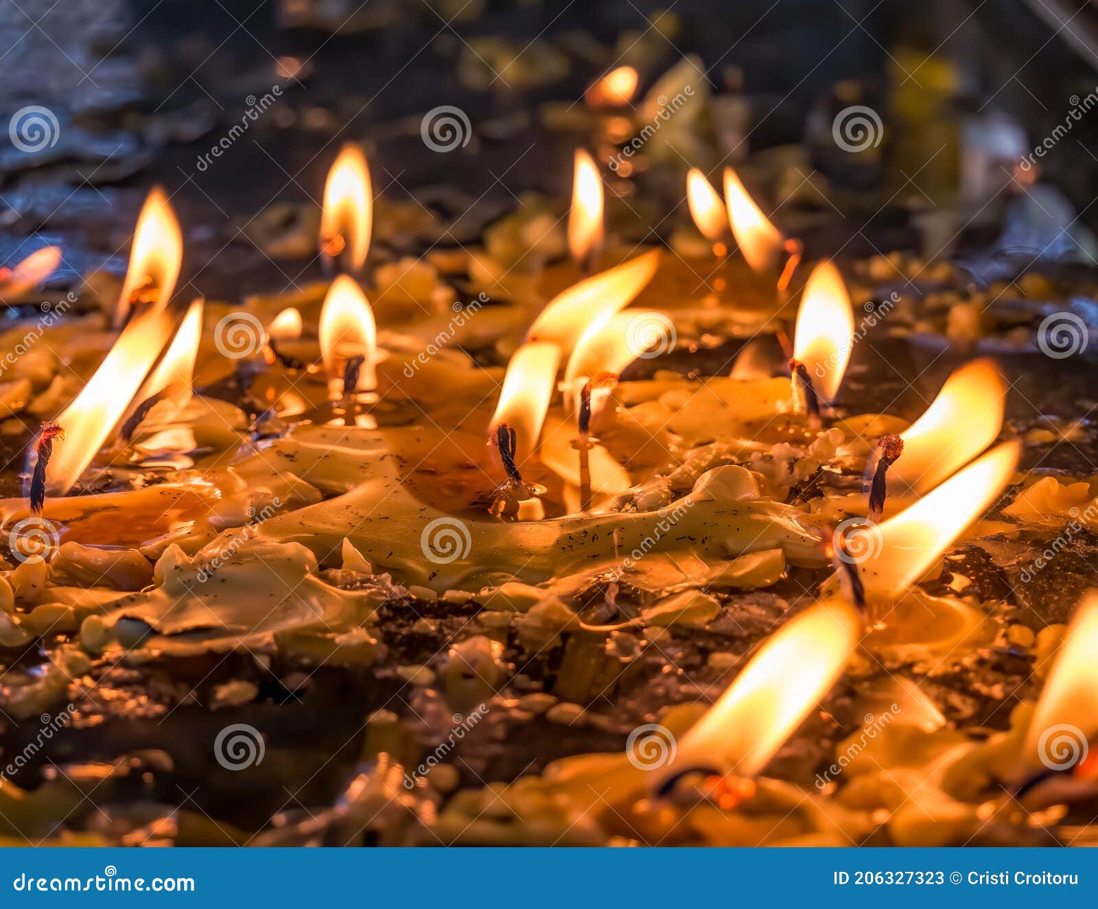 Burning Candles in Memory of the Dead. Melted Wax from Candles Stock