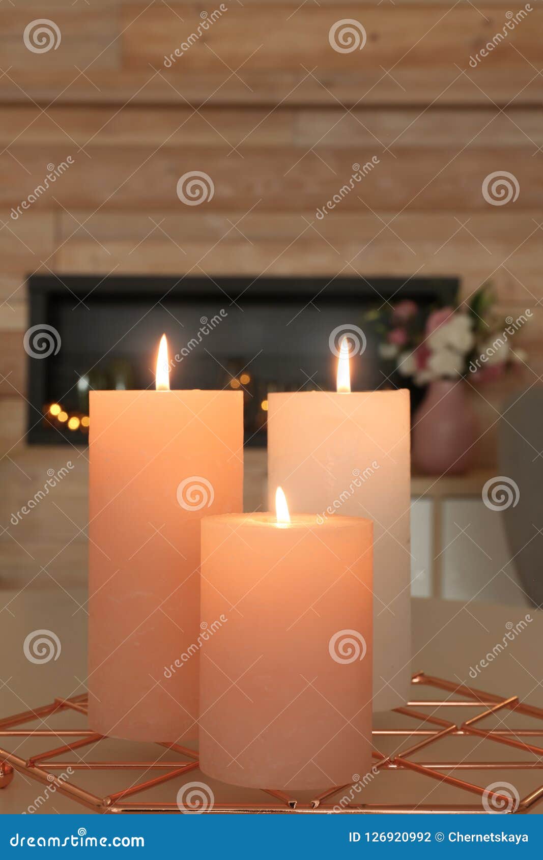 Burning candles on table stock photo. Image of background 126920992