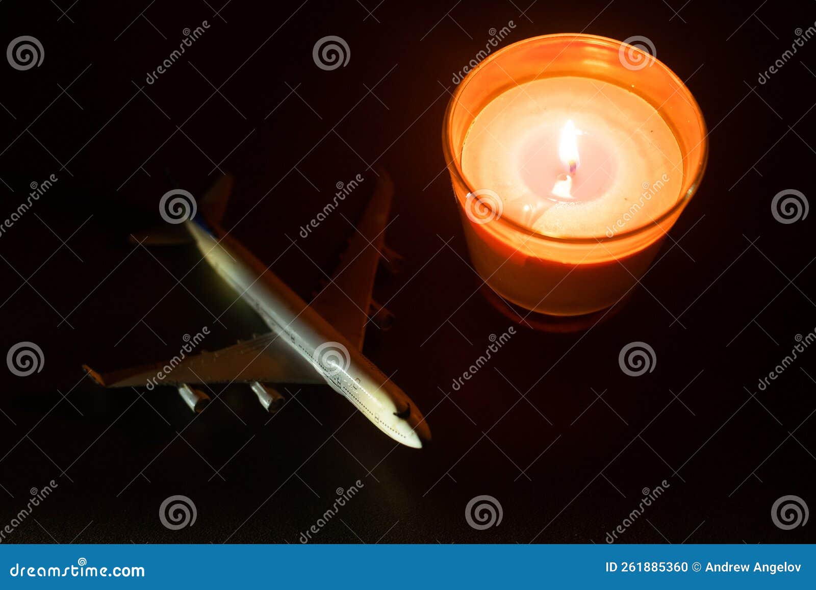 Burning Candles and Toy Airplane on Table Stock Photo Image of